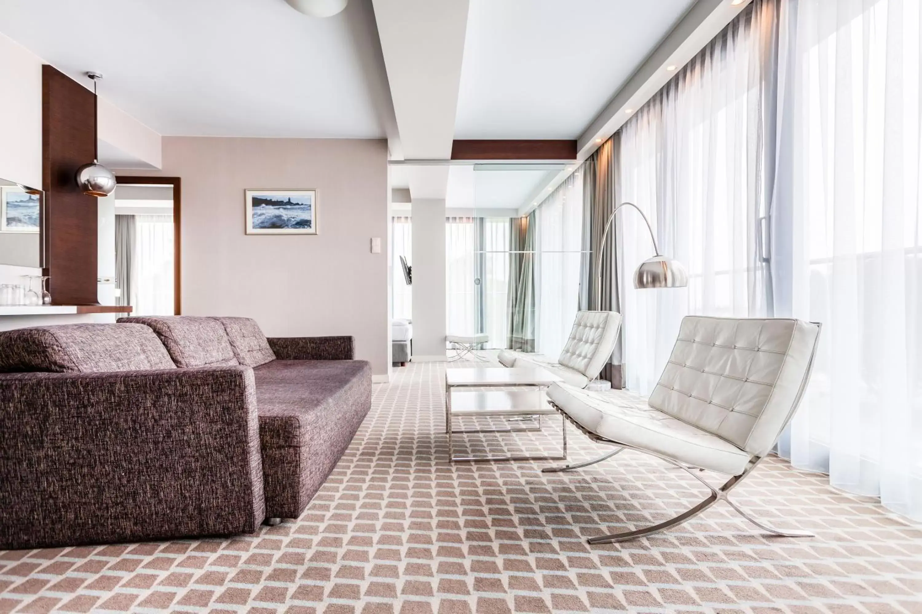Living room in Marine Hotel by Zdrojowa