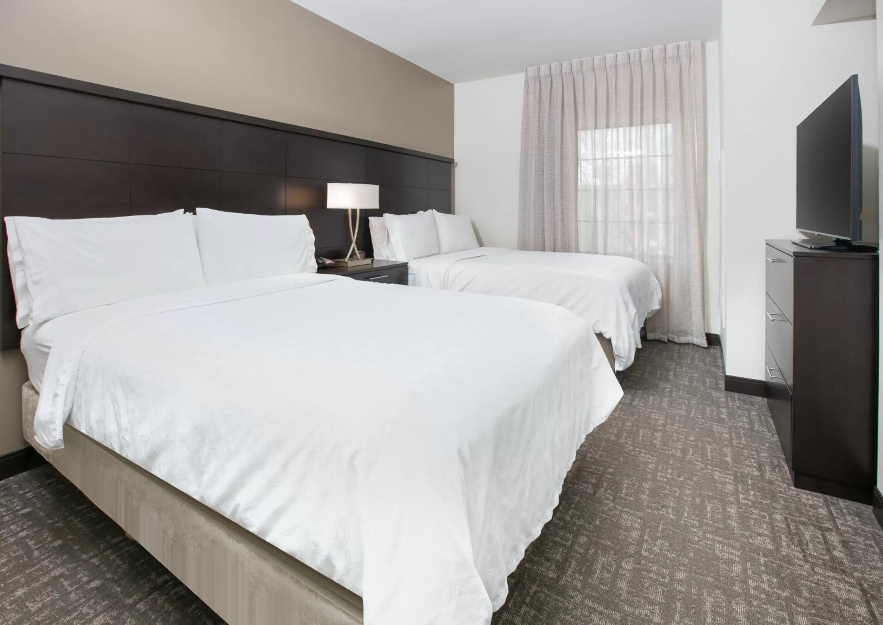 Photo of the whole room, Bed in Staybridge Suites Plano - Richardson Area, an IHG Hotel