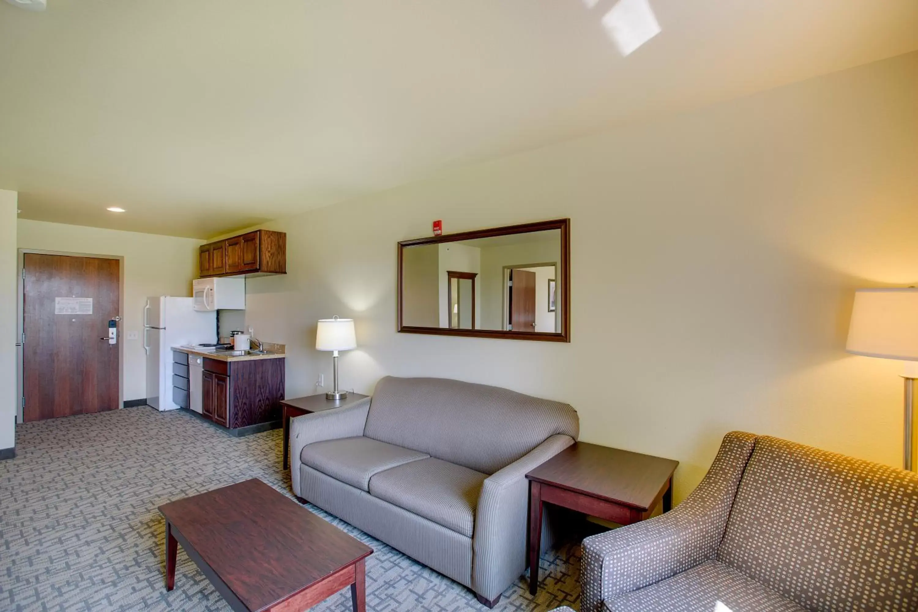 Living room, Seating Area in Cobblestone Inn & Suites - Clintonville