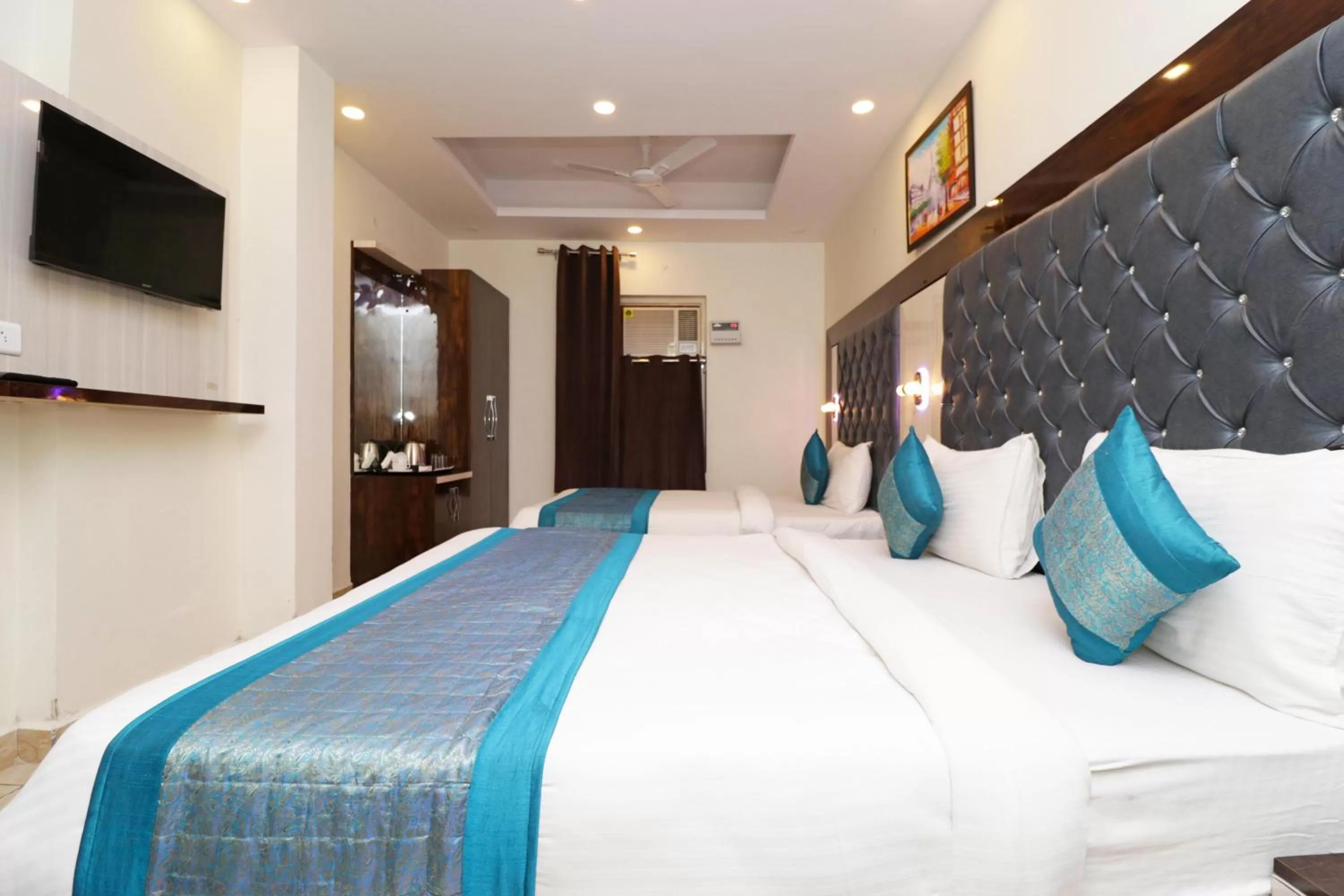 Photo of the whole room, Bed in Airport Hotel Shivaka Inn