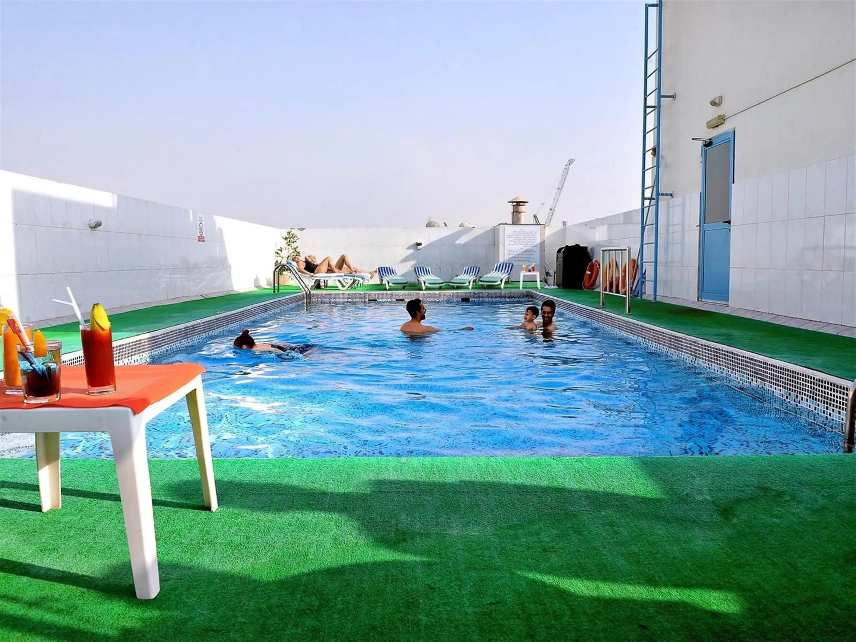 Swimming Pool in Signature Inn Hotel - Free Parking