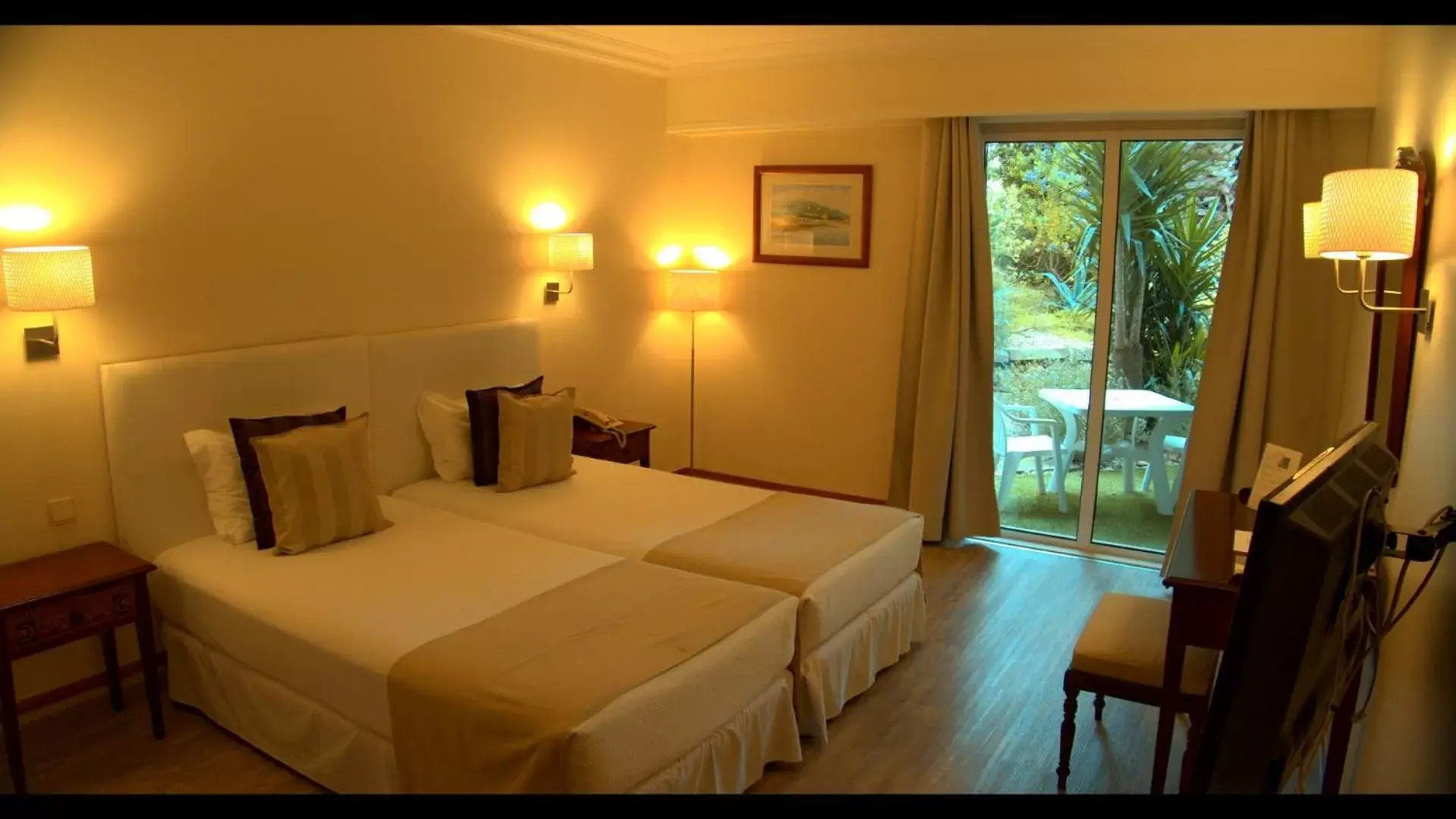 Bed in Hotel Solar Palmeiras