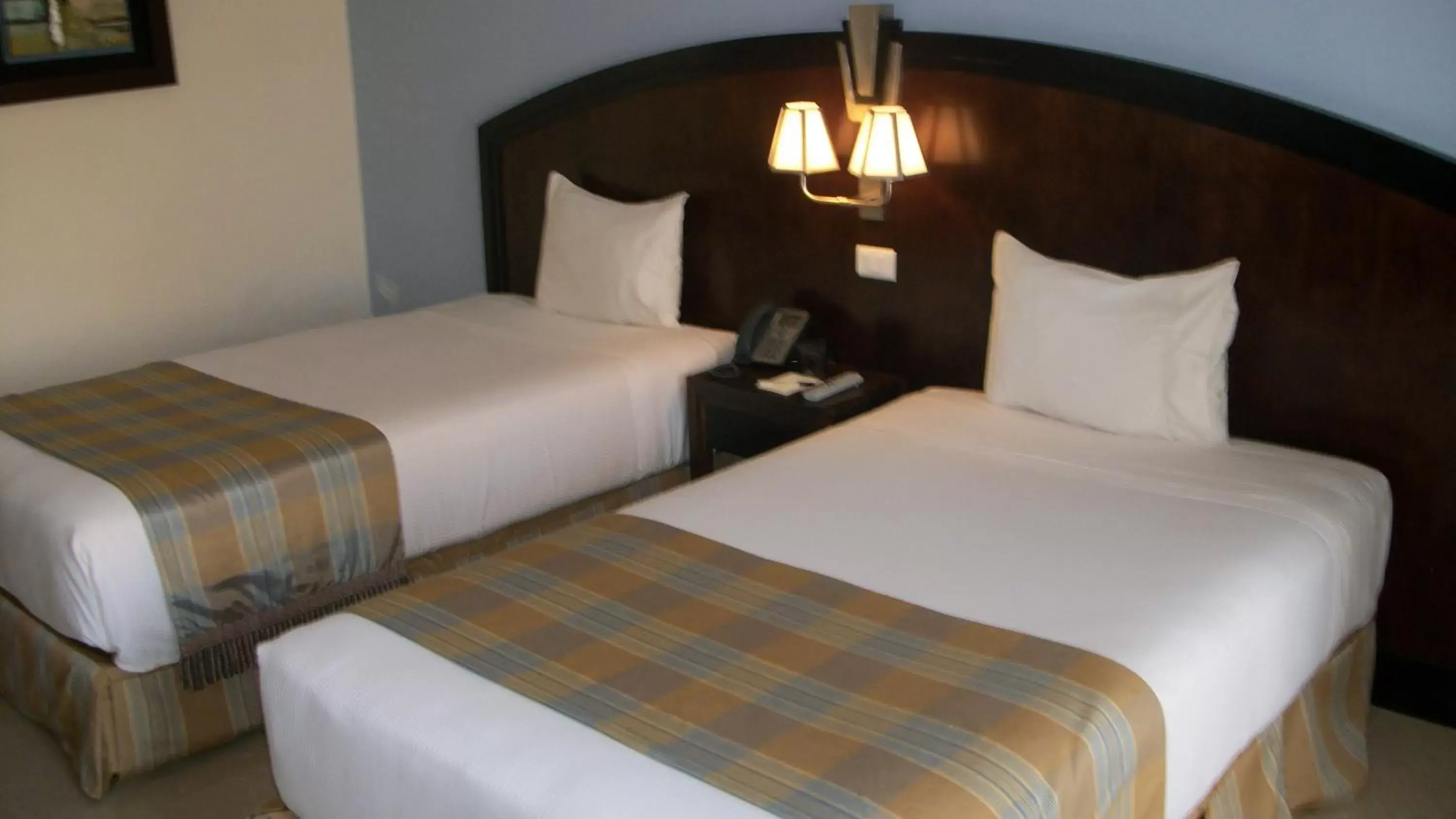 Bed in Stella Di Mare Beach Hotel & Spa