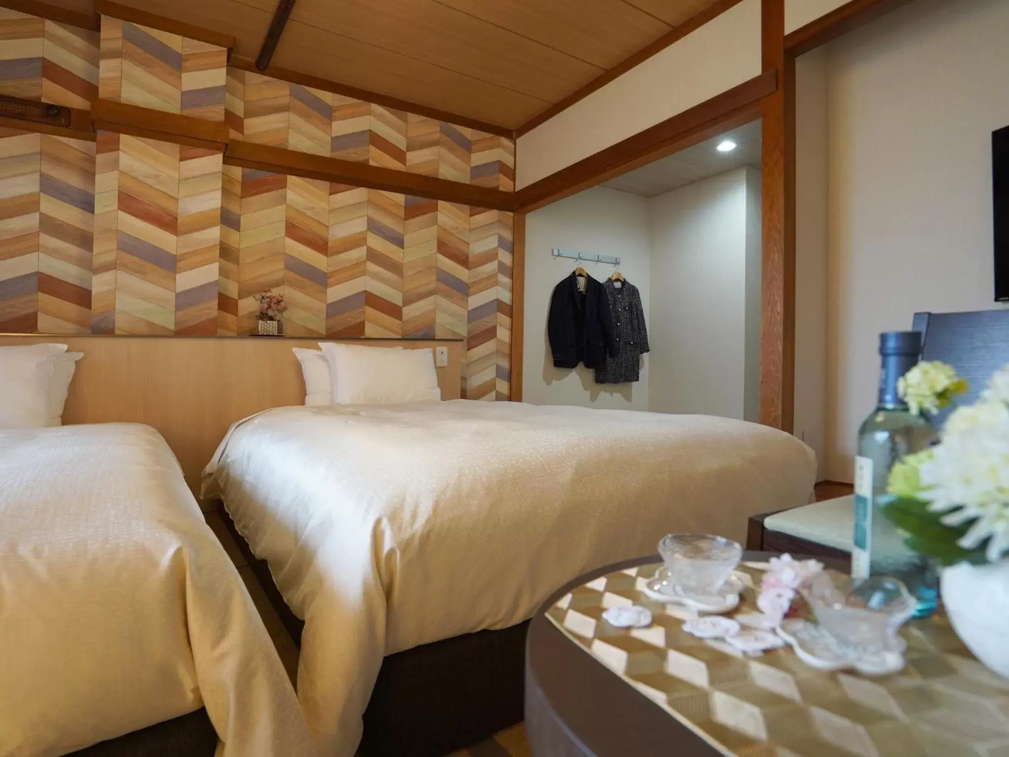 Photo of the whole room, Bed in Hotel New Gaea Iizuka