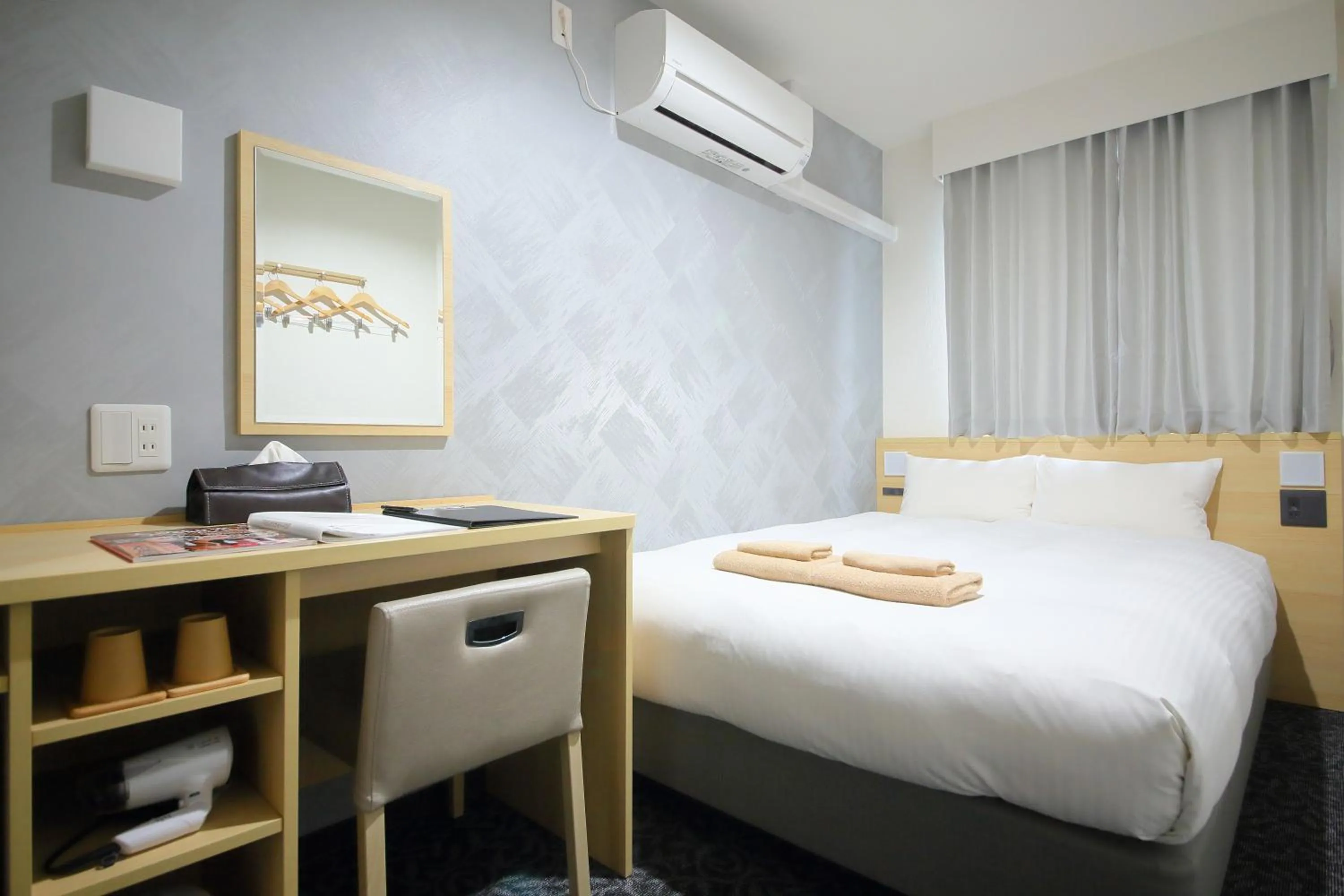 Bed in Hotel Shin-Imamiya