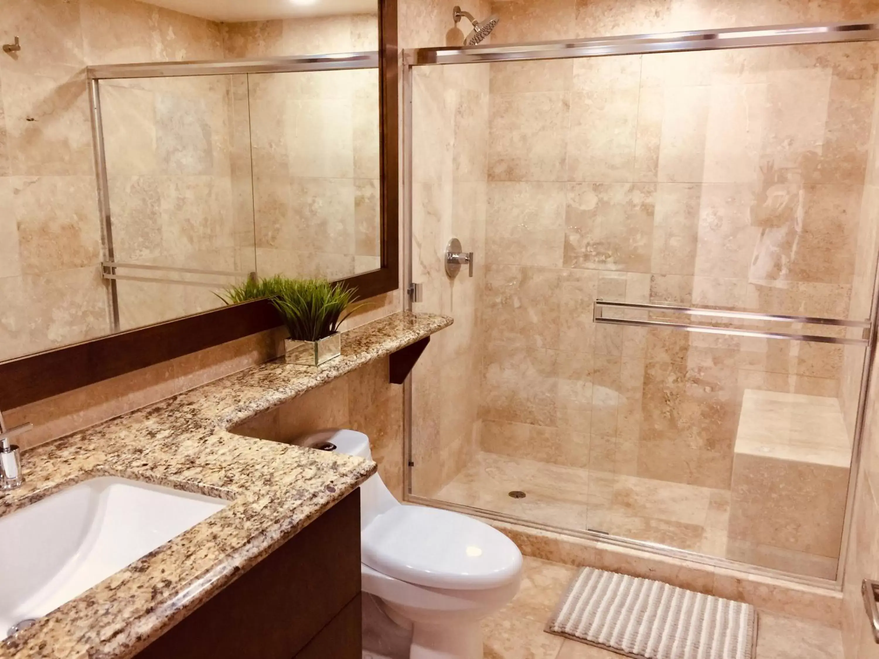 Bathroom in Fabulous Ocean View Condo with Walking Distance to the Beach!