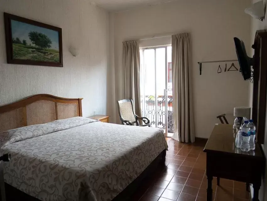 Photo of the whole room, Bed in Posada Doña Lala