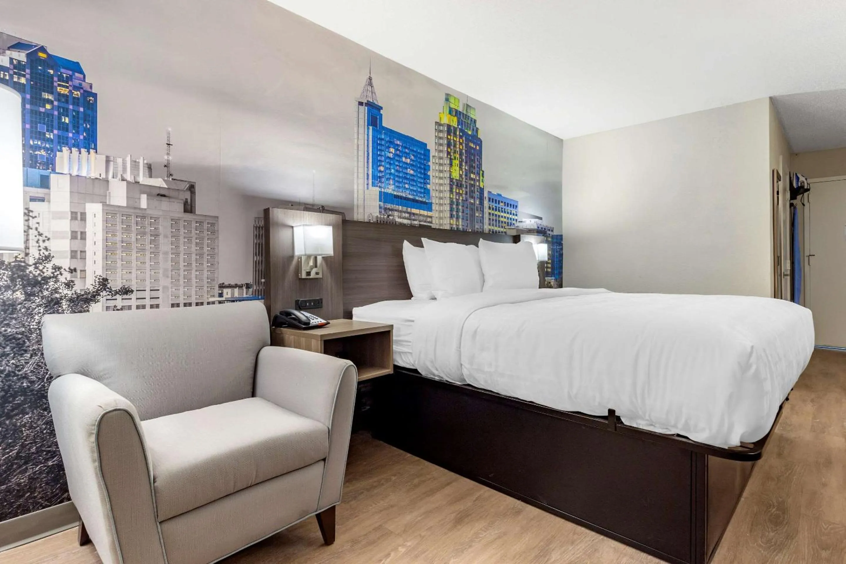 Photo of the whole room, Bed in Clarion Pointe Raleigh Midtown