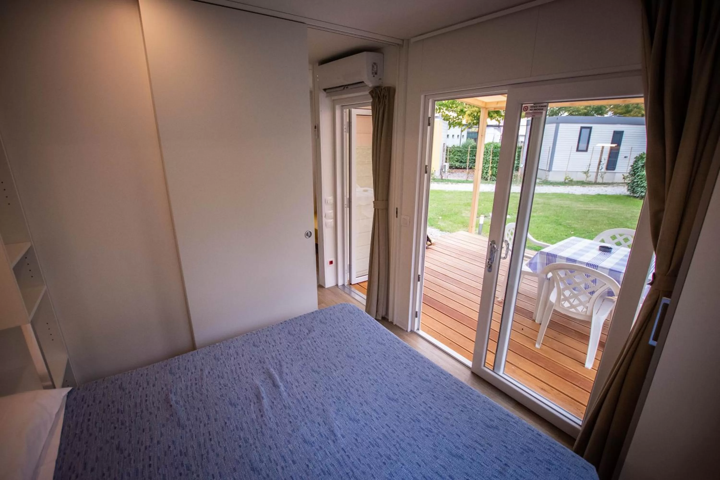 Bed in AgriCamping AlbaVillage Hotel & Wellness