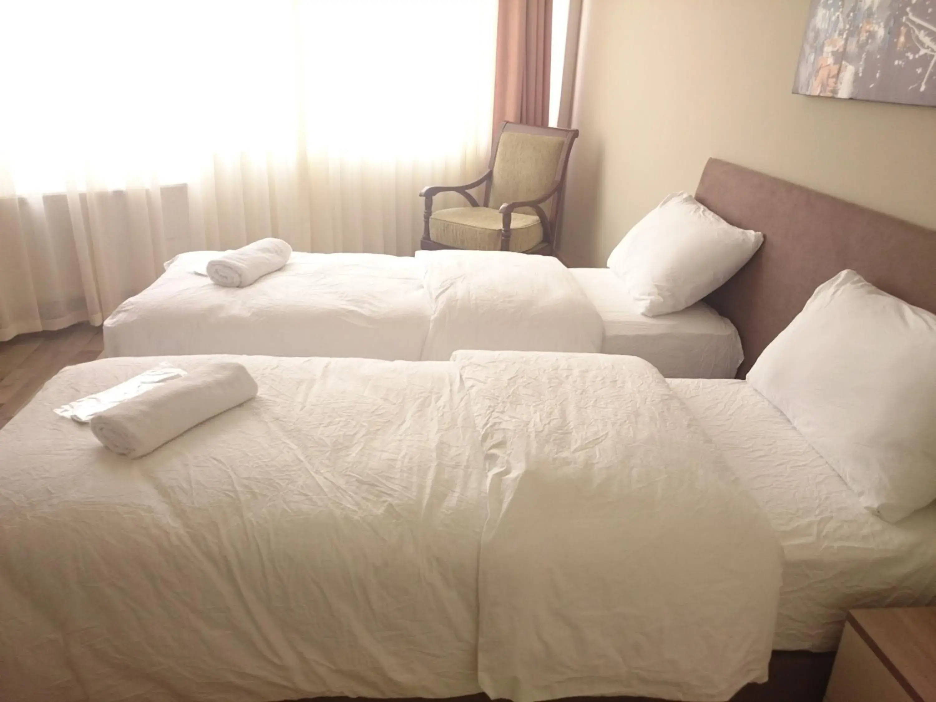 Bed in Puffin Suites