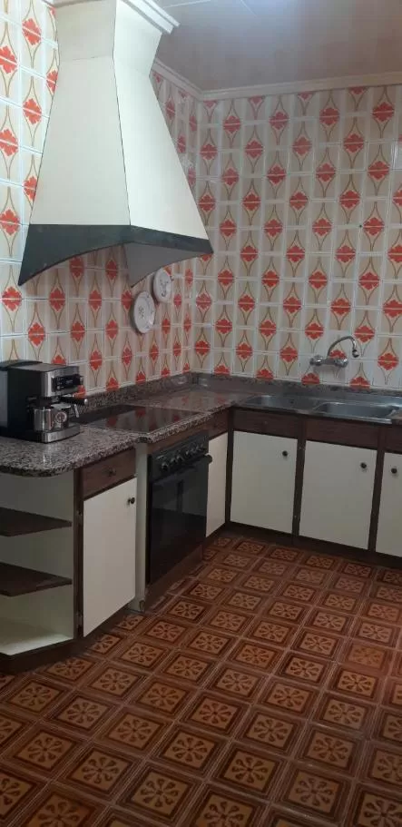 Kitchen/Kitchenette in Pensión Benavente AP-7 3 min - Playa 5 min coche