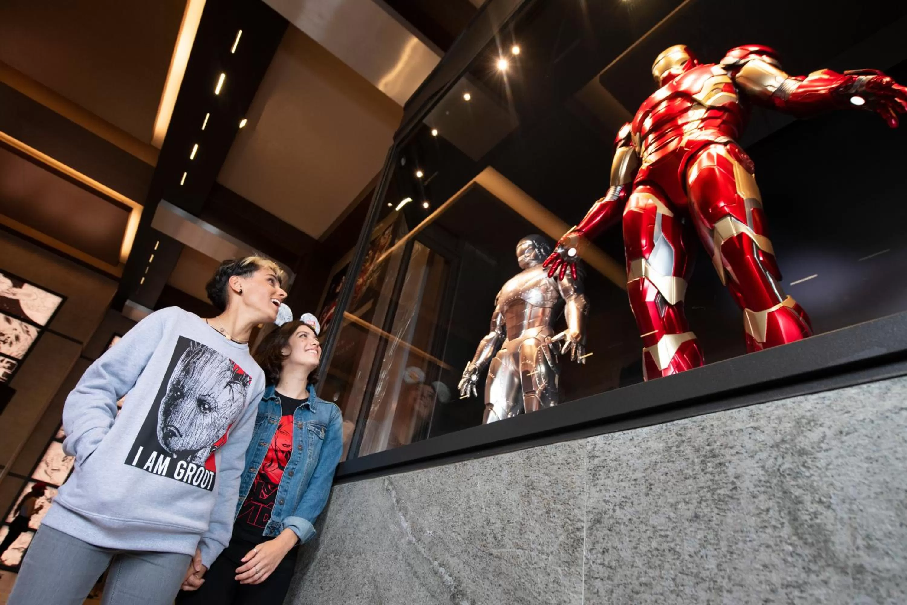 People in Disney Hotel New York - The Art of Marvel