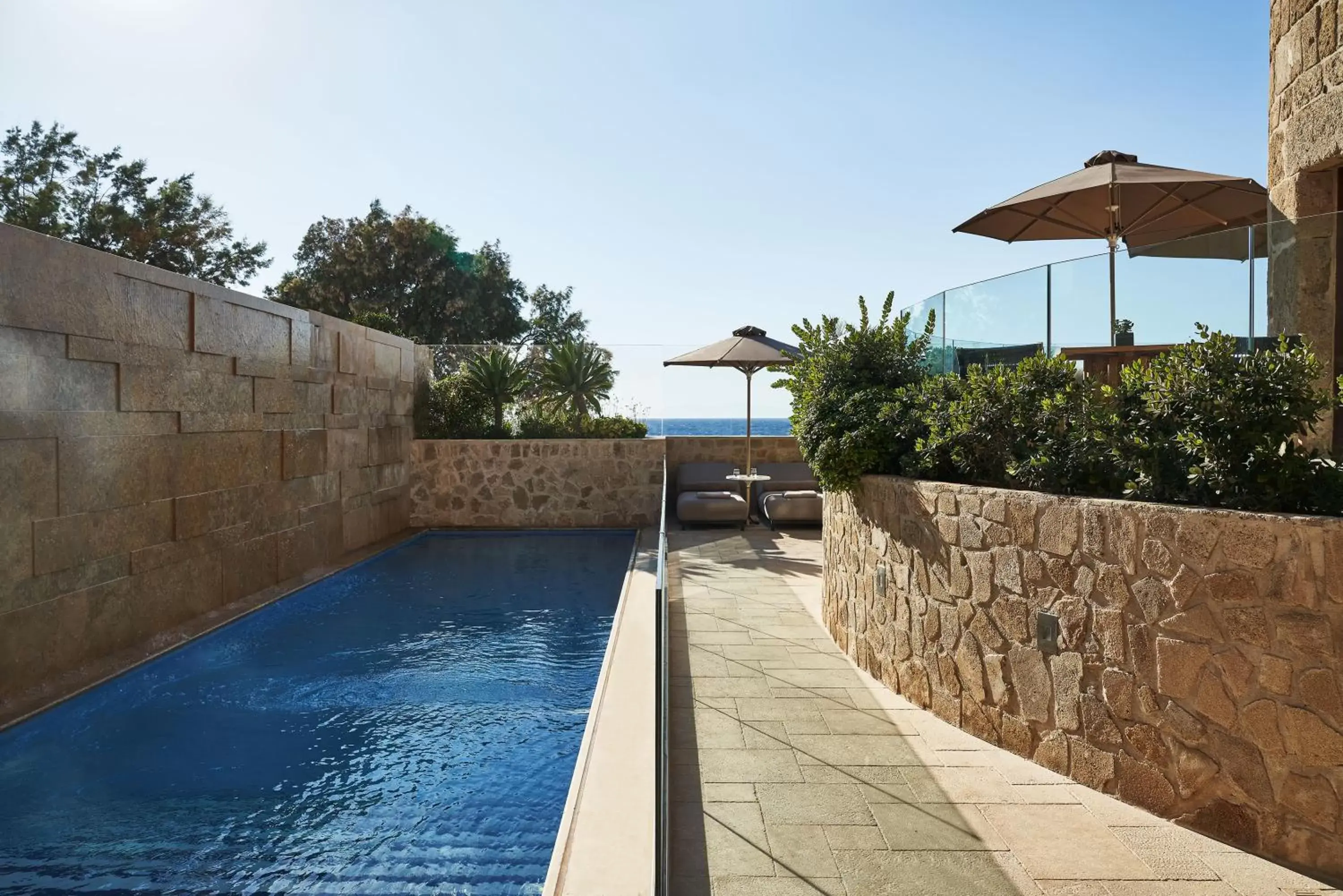 Patio, Swimming Pool in Bellevue On The Beach Suites