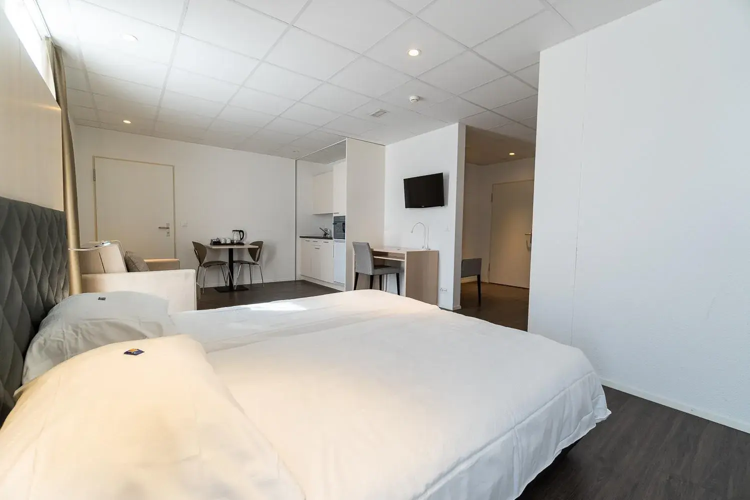 Photo of the whole room, Bed in Hotel Hine Adon Bern Airport