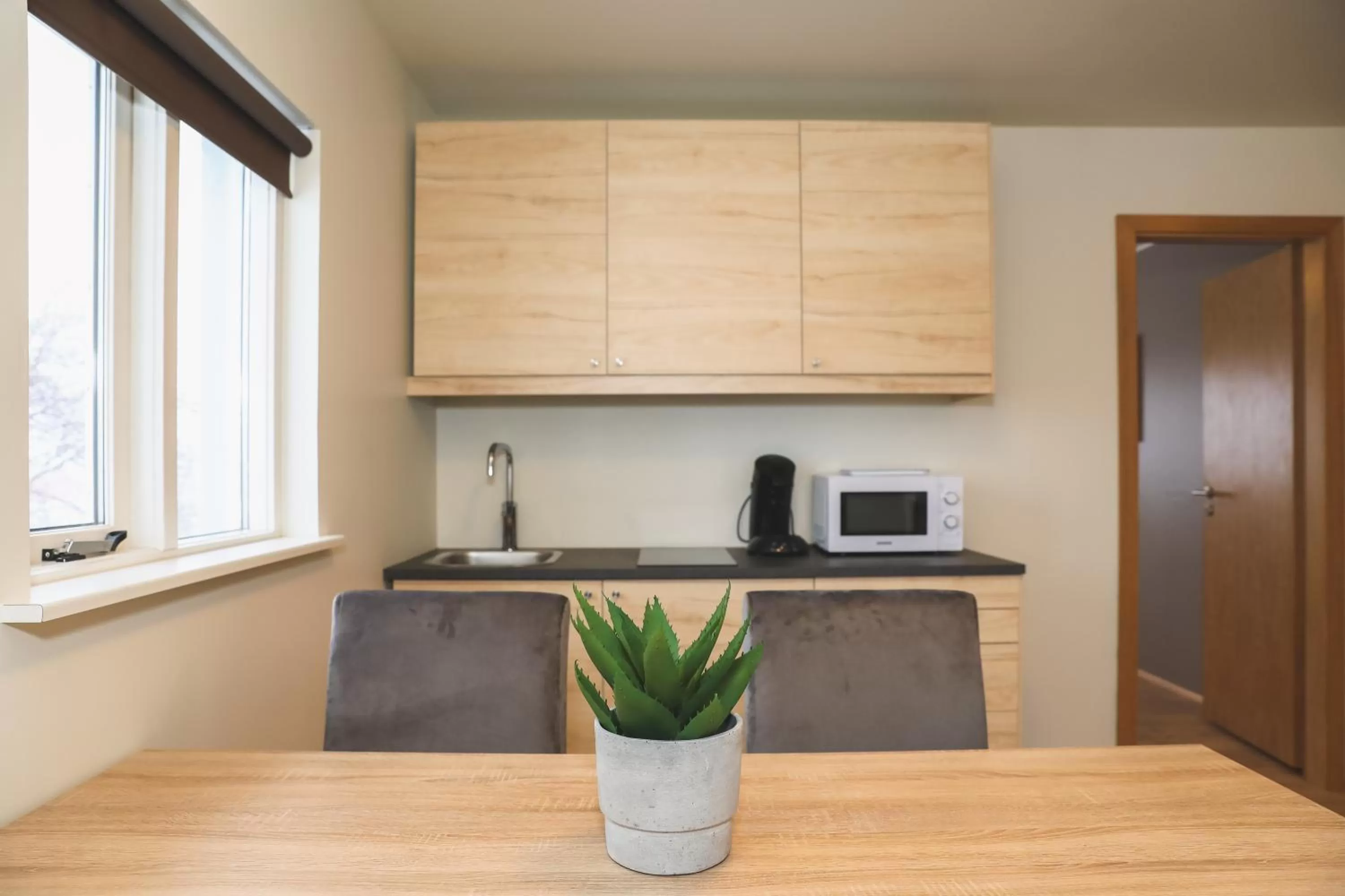 Kitchen or kitchenette in E18 Apartments
