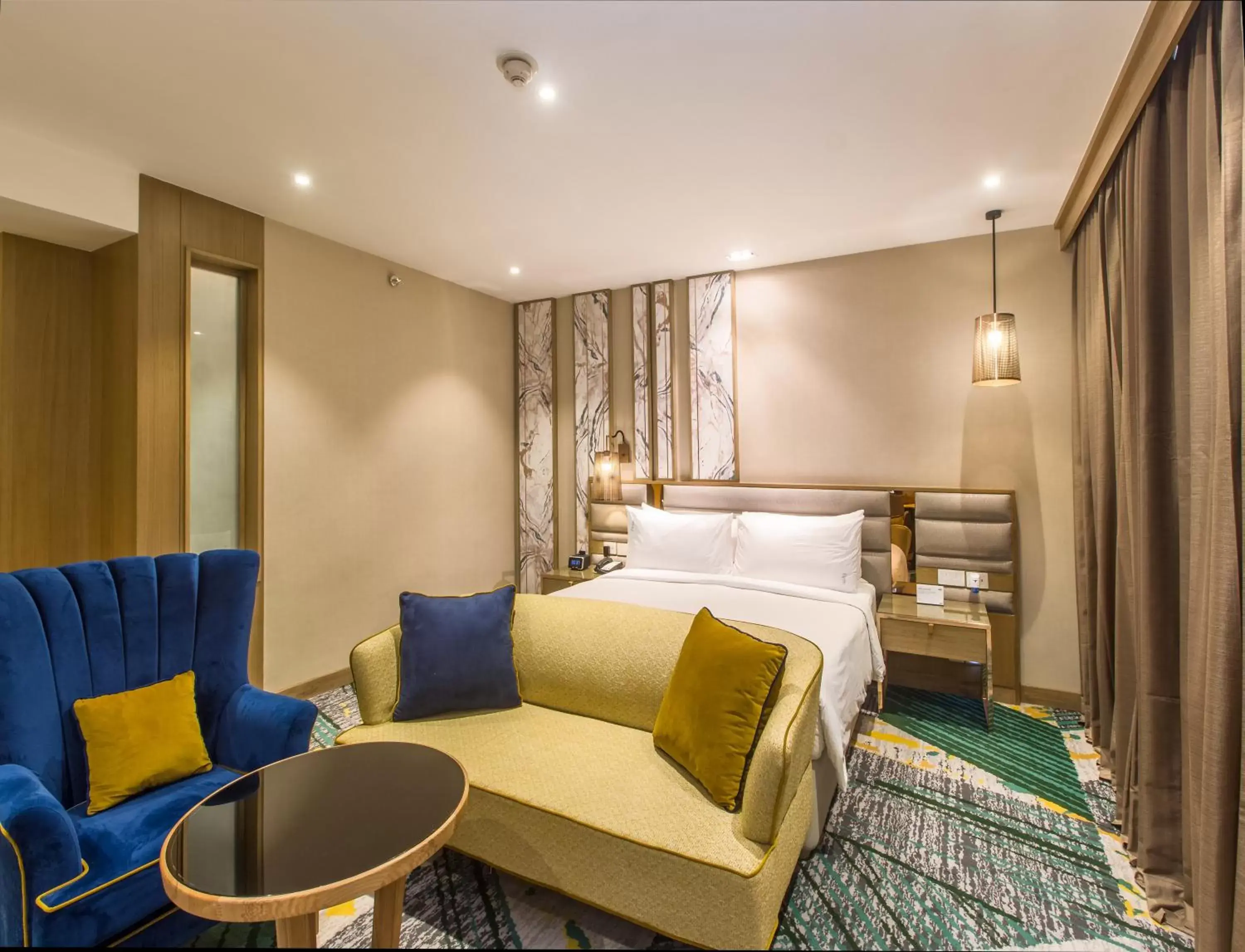 Bedroom, Bed in Holiday Inn Chandigarh Zirakpur, an IHG Hotel