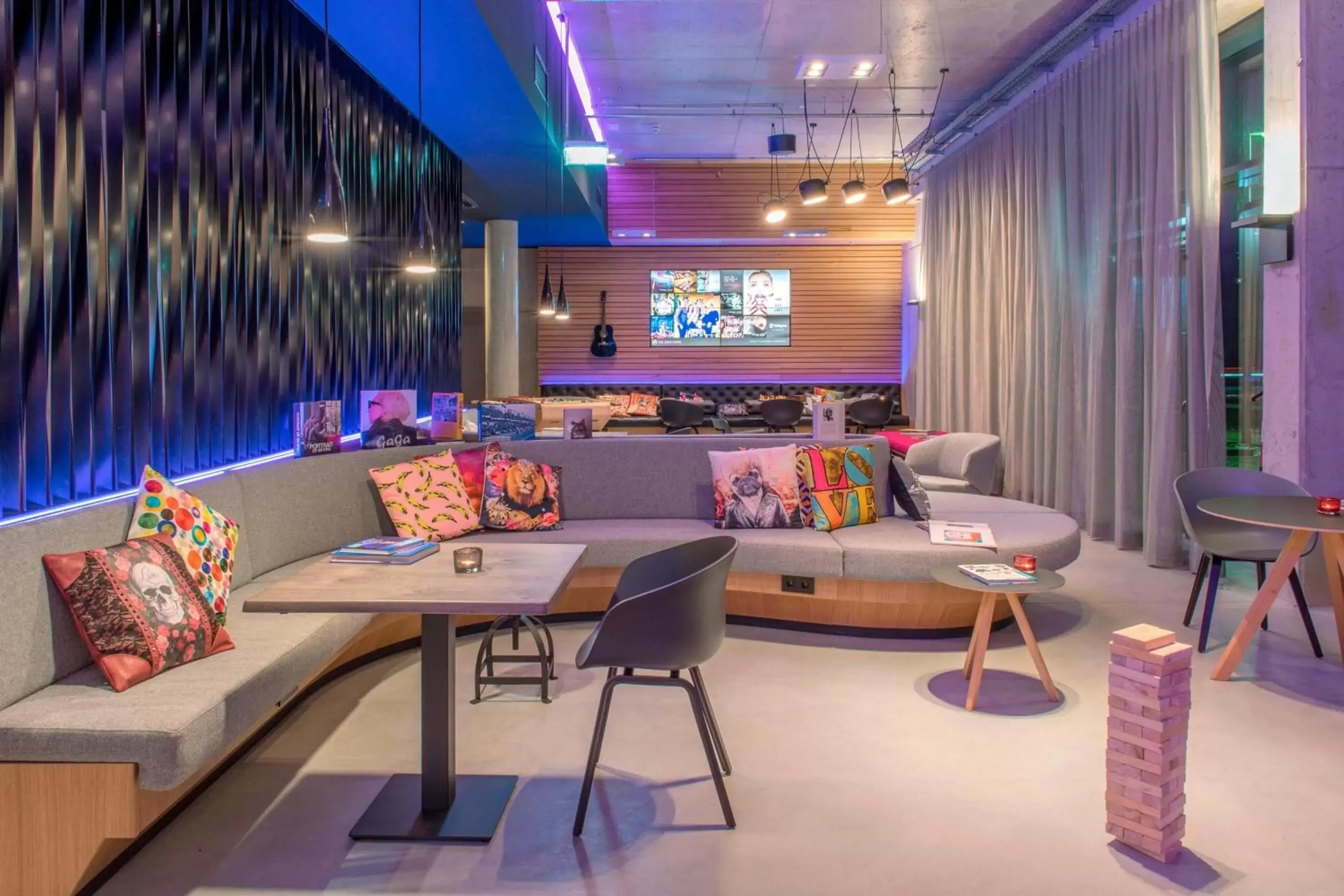 Living room in Moxy Munich Messe