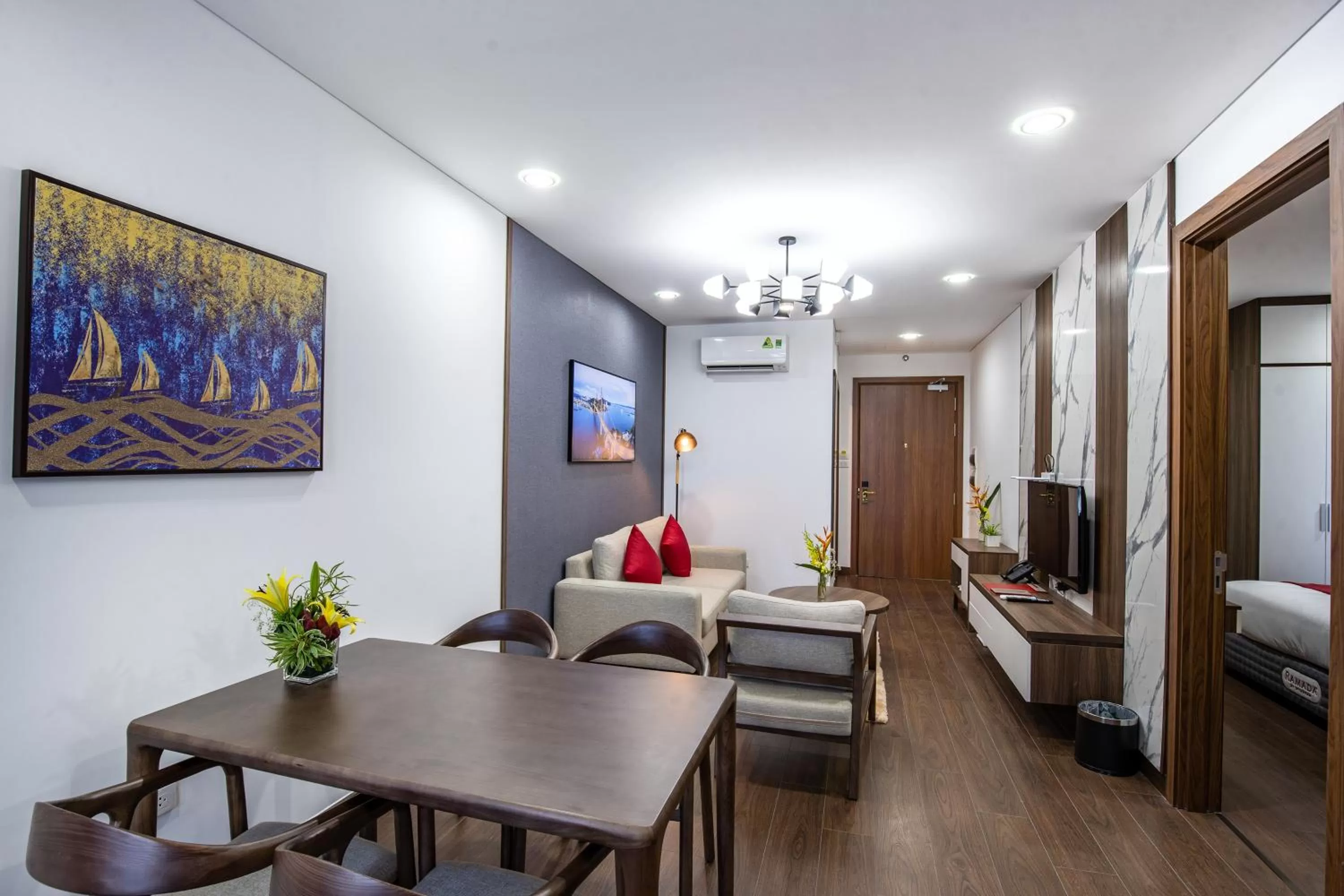 Dining area, Bed in Ramada Hotel & Suites by Wyndham Halong Bay View