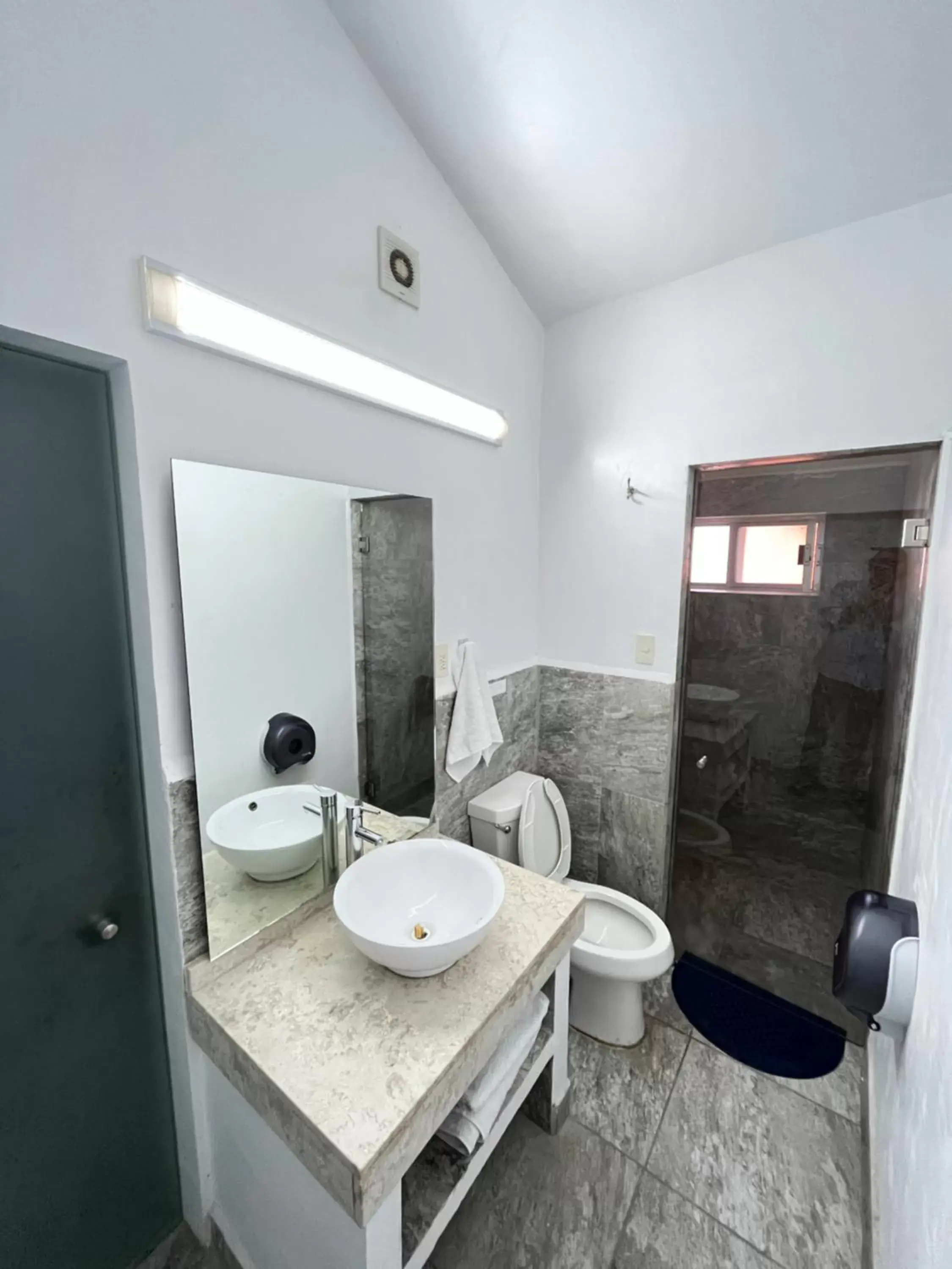 Bathroom in Genesis Suites / Lofts