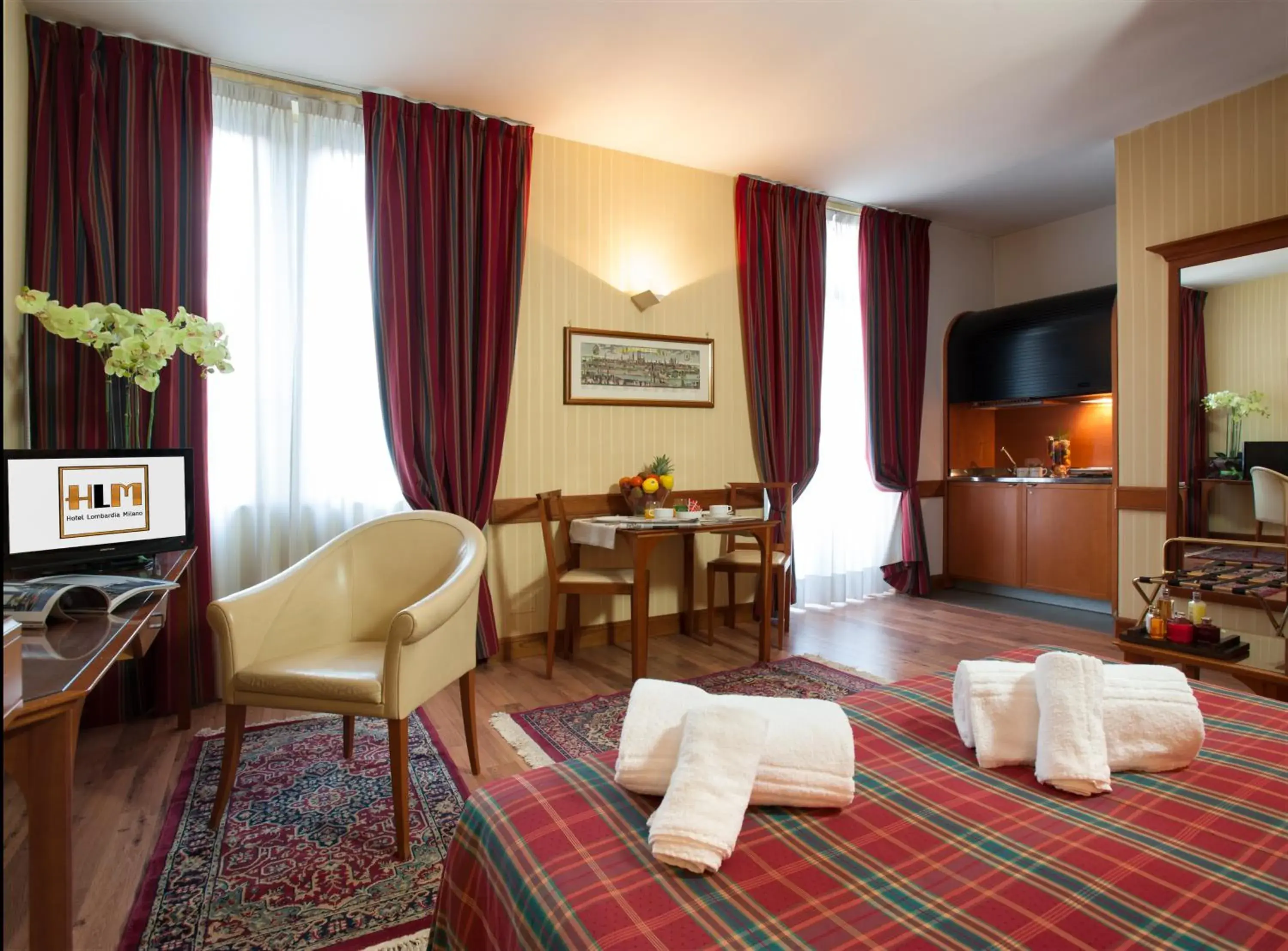 Photo of the whole room, Seating Area in Hotel Lombardia