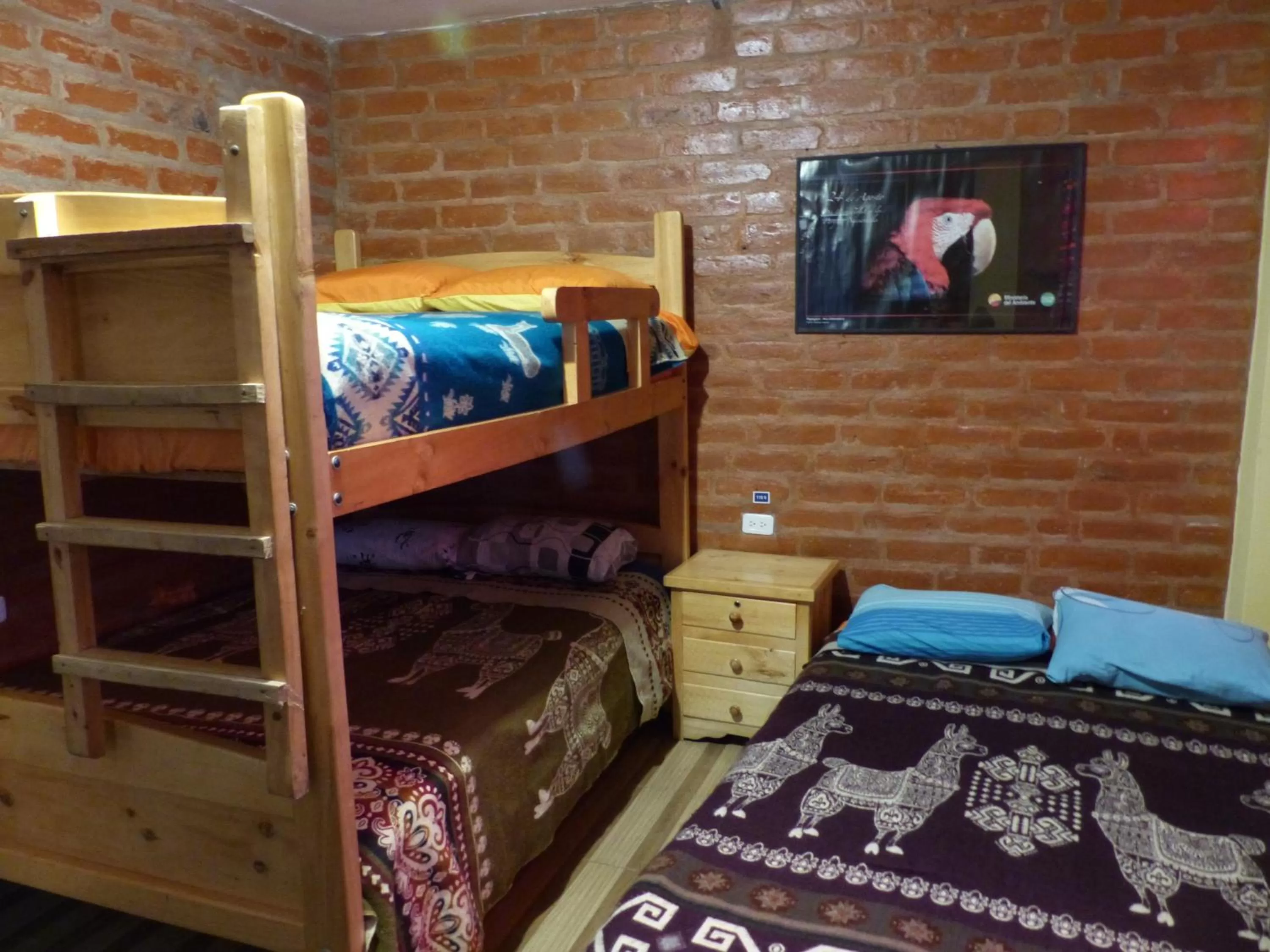 Property building, Bed in Hostal La Casa Amarilla City