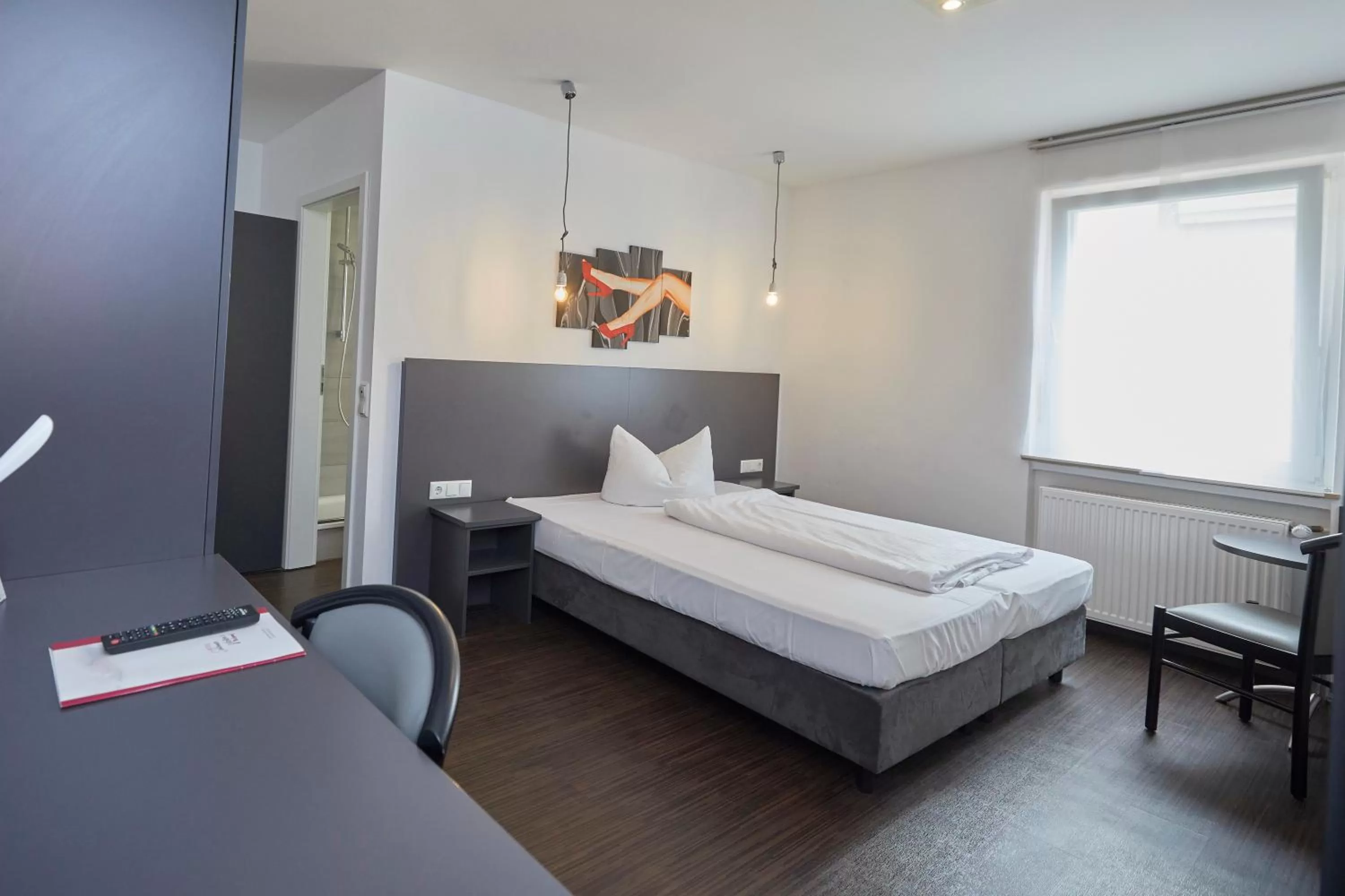 Photo of the whole room, Bed in Hotel Schlemmer Das familäre Altstadt - Hotel mit Herz