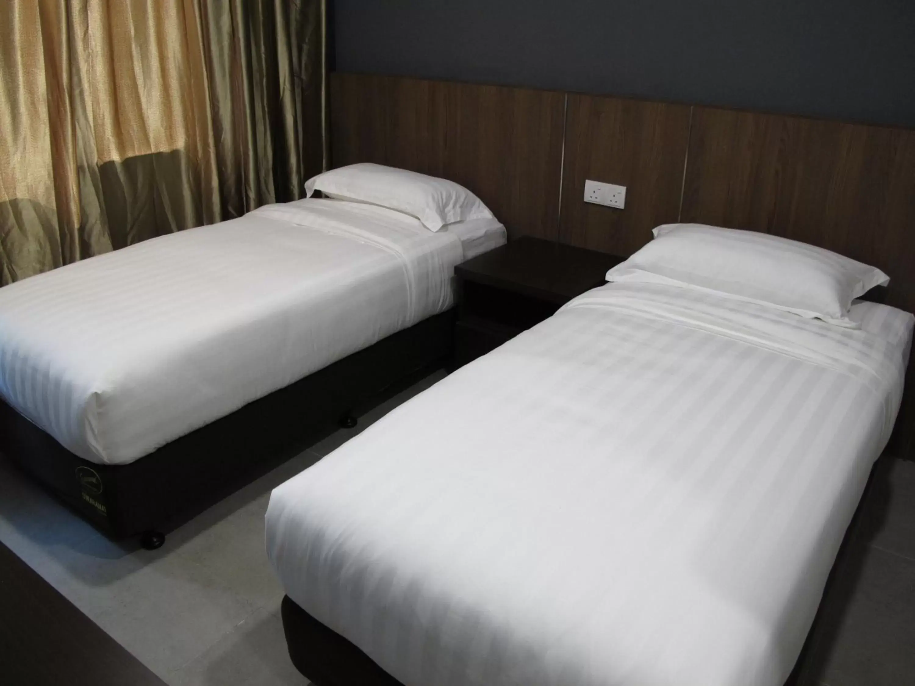 Bed in HOTEL SUKARAMAI