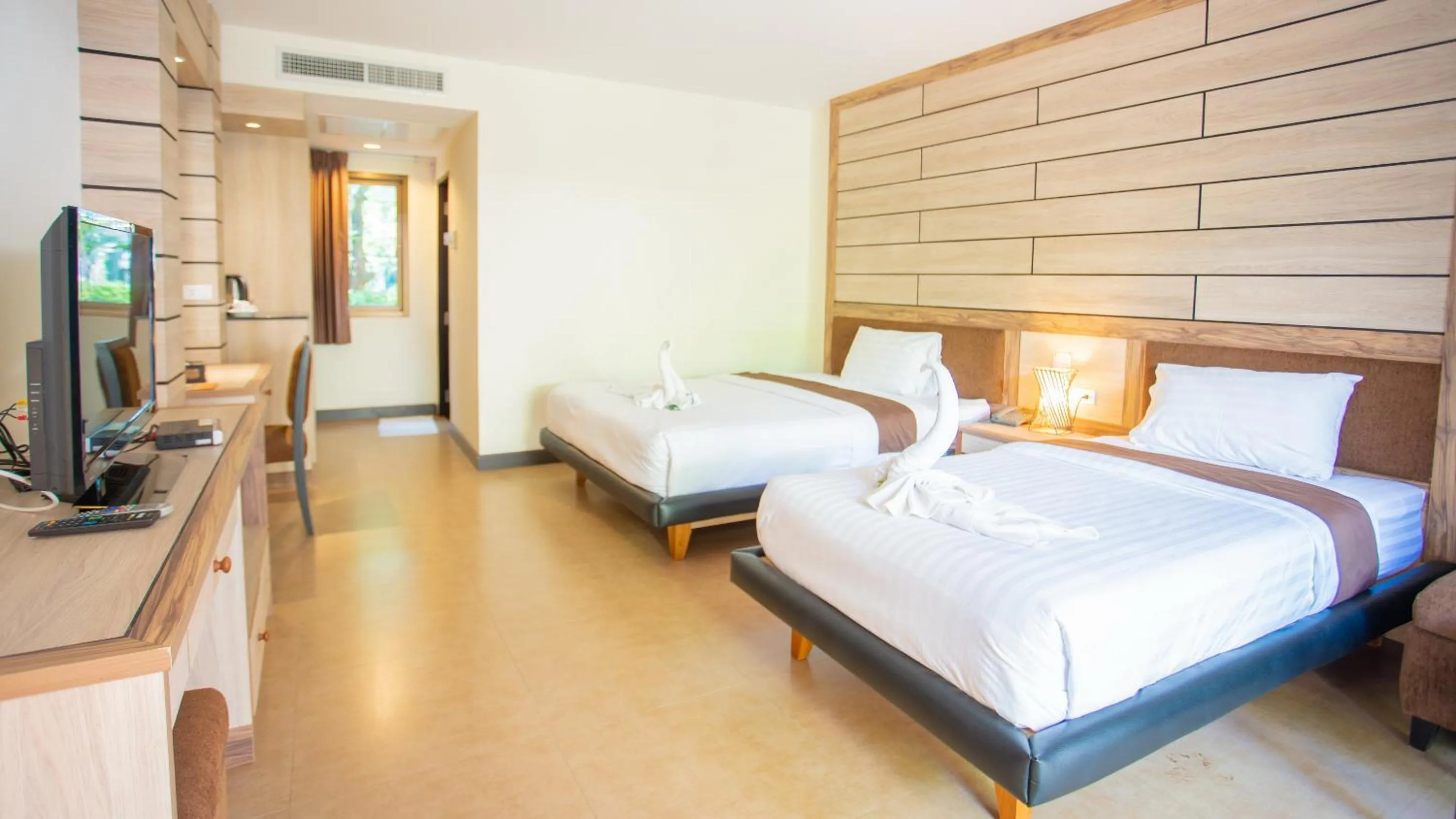 Bed in Chawalun Resort