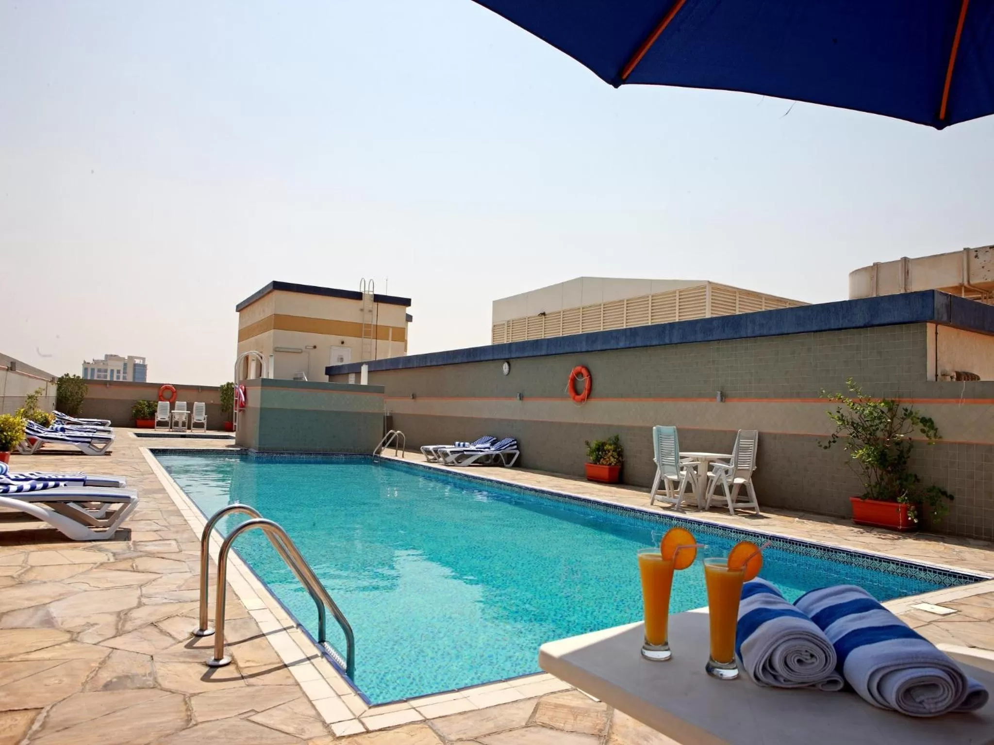 Swimming pool in Rose Garden Hotel Apartments - Al Barsha, Near Metro Station
