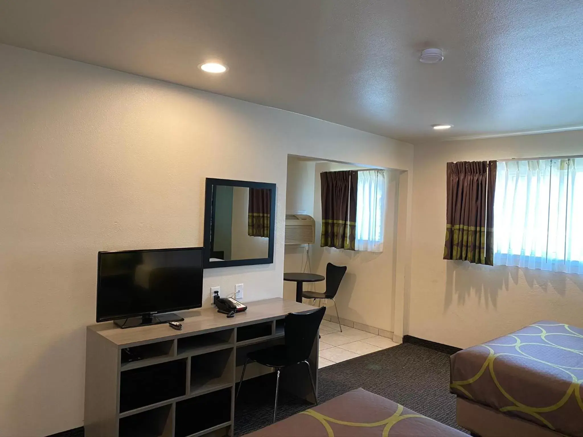 Photo of the whole room, TV/Entertainment Center in Super 8 by Wyndham Monterey