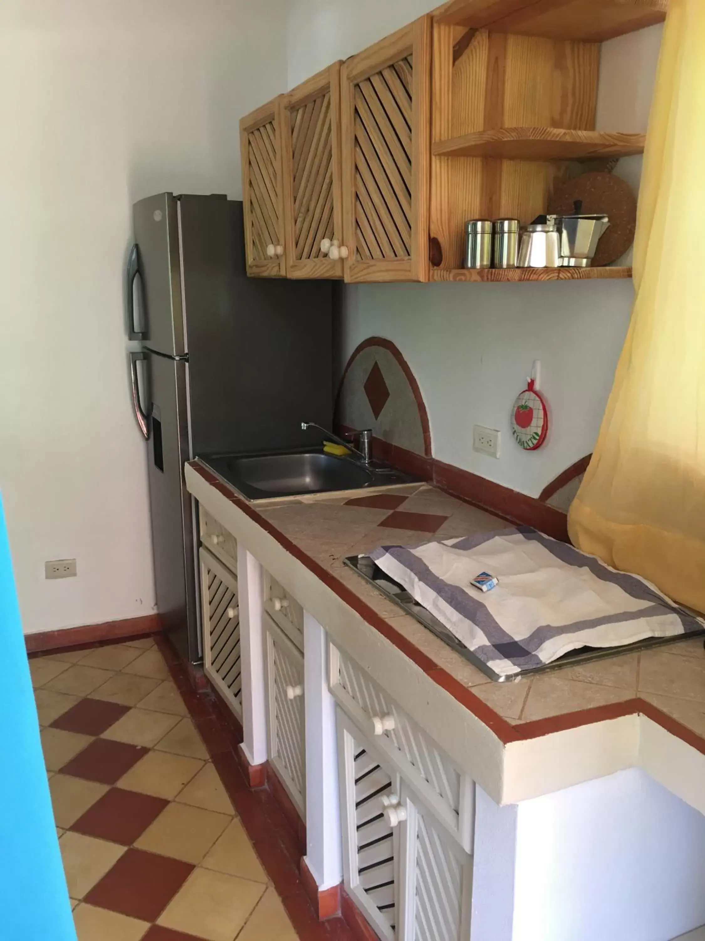 Kitchen/Kitchenette in Hotel - Residencial Madrugada