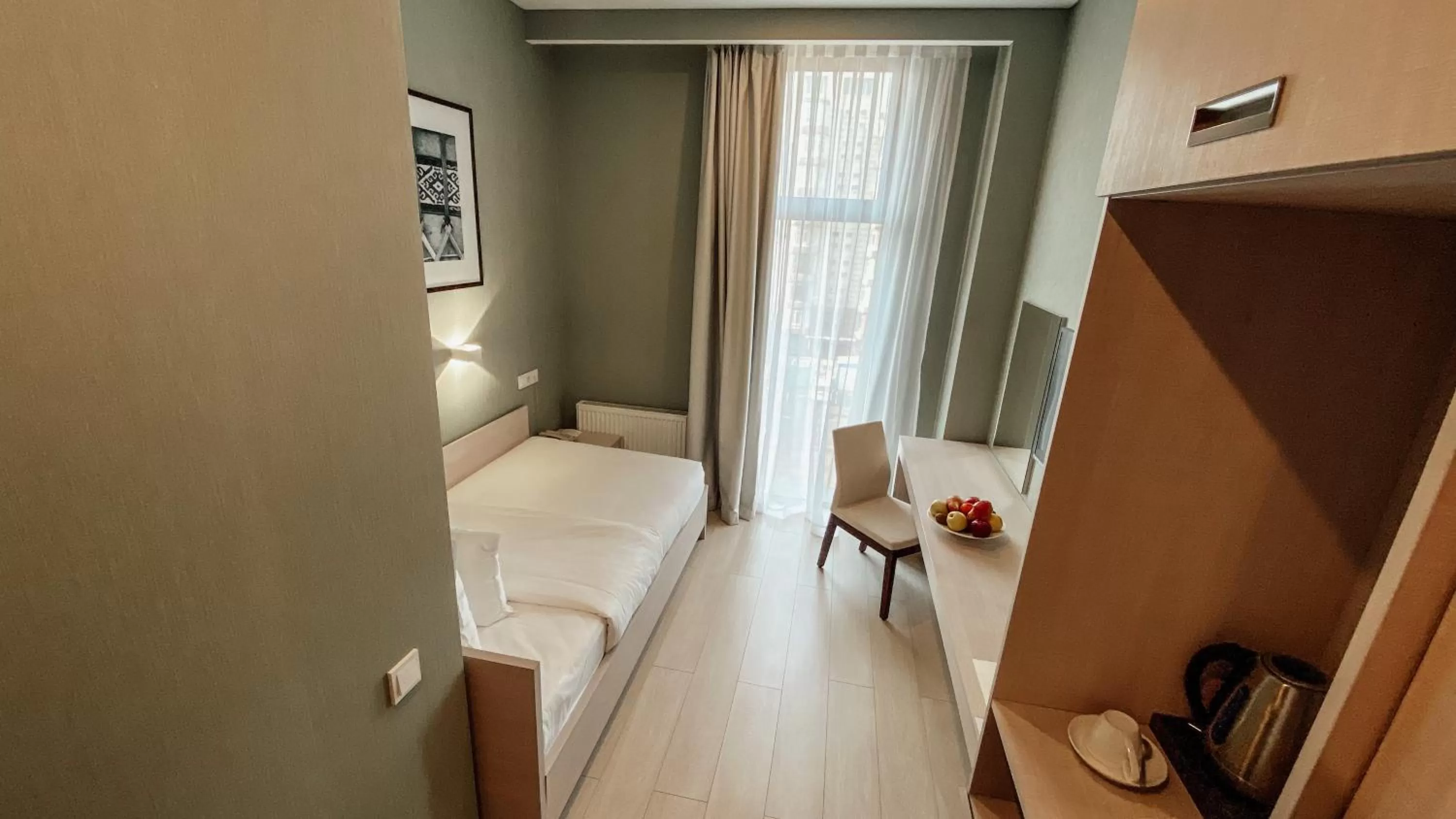 Photo of the whole room, Bed in Resident City Hotel