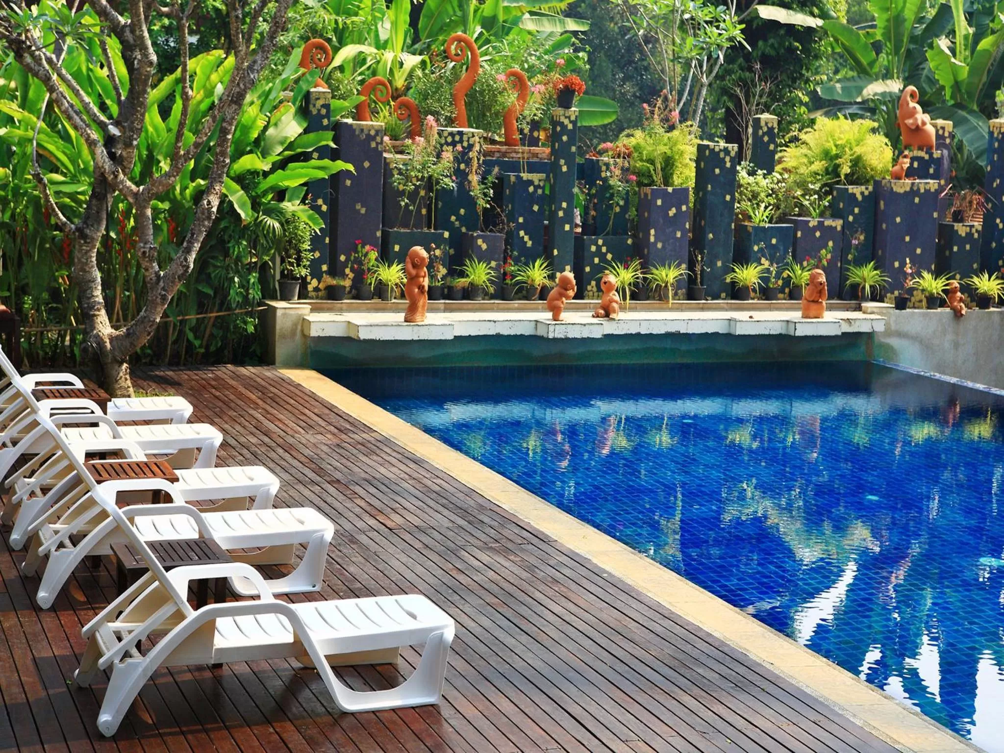 Swimming pool in Lanna Dusita Riverside Boutique Resort