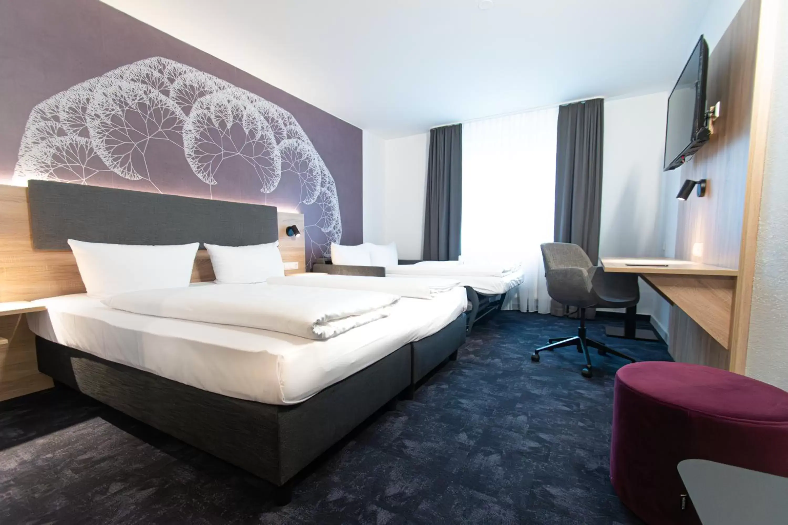 Photo of the whole room, Bed in Taste Hotel Jettingen