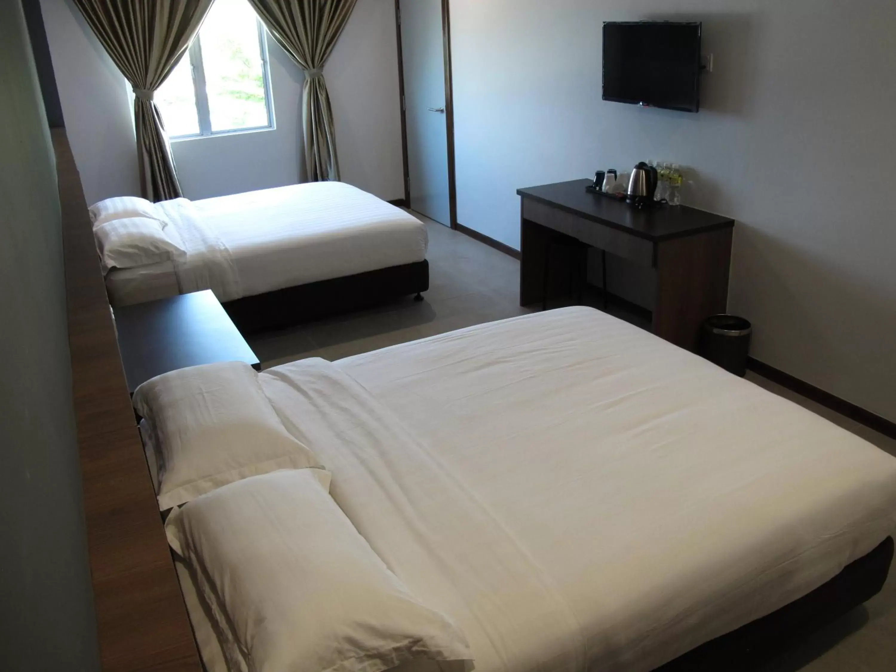 Bed in HOTEL SUKARAMAI