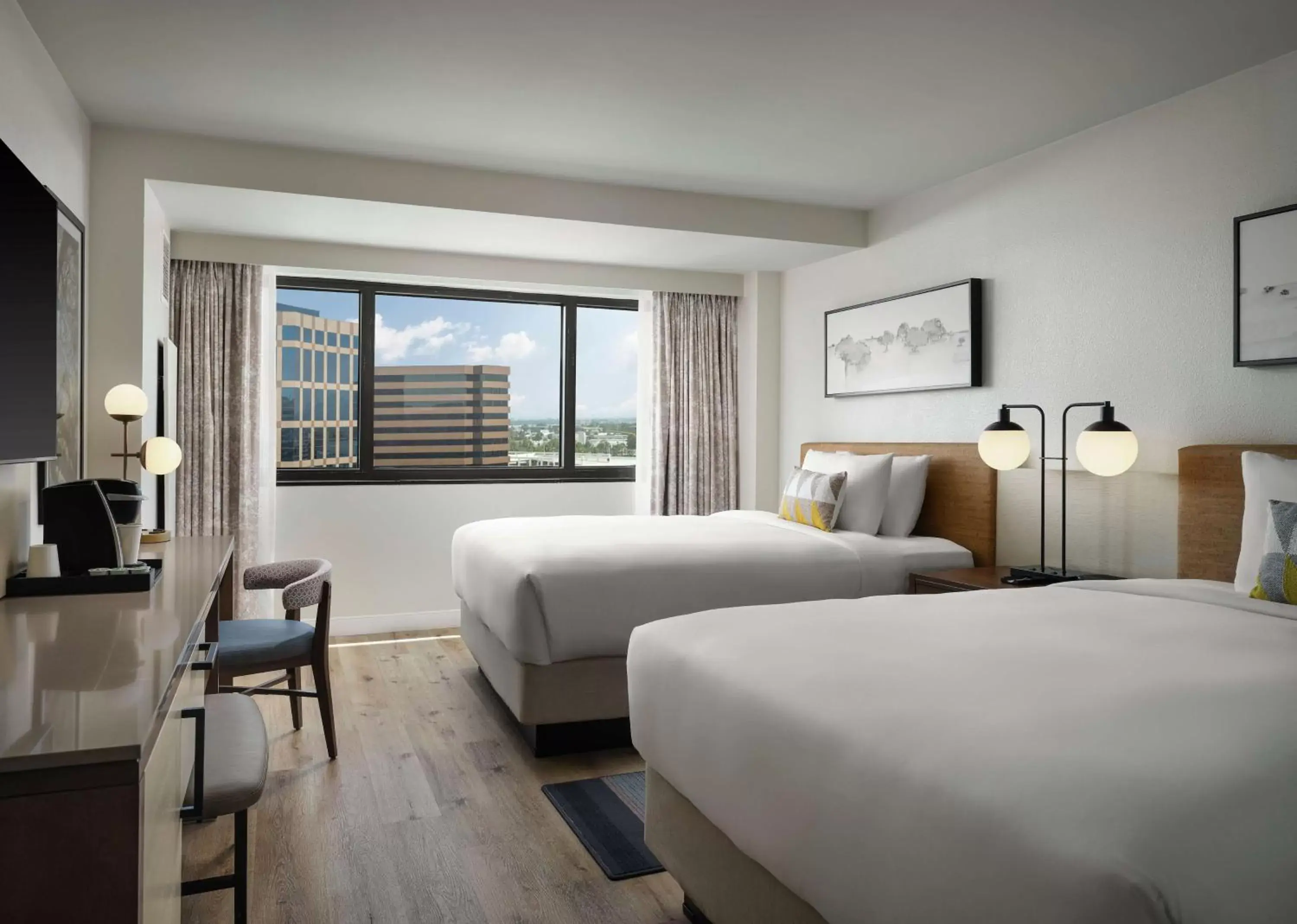 Premier Two Queen Room - Mobility Accessible Tub in Sonesta Irvine John Wayne Airport Premier Two Queen Room - Mobility Accessible Tub in Sonesta Irvine John Wayne Airport