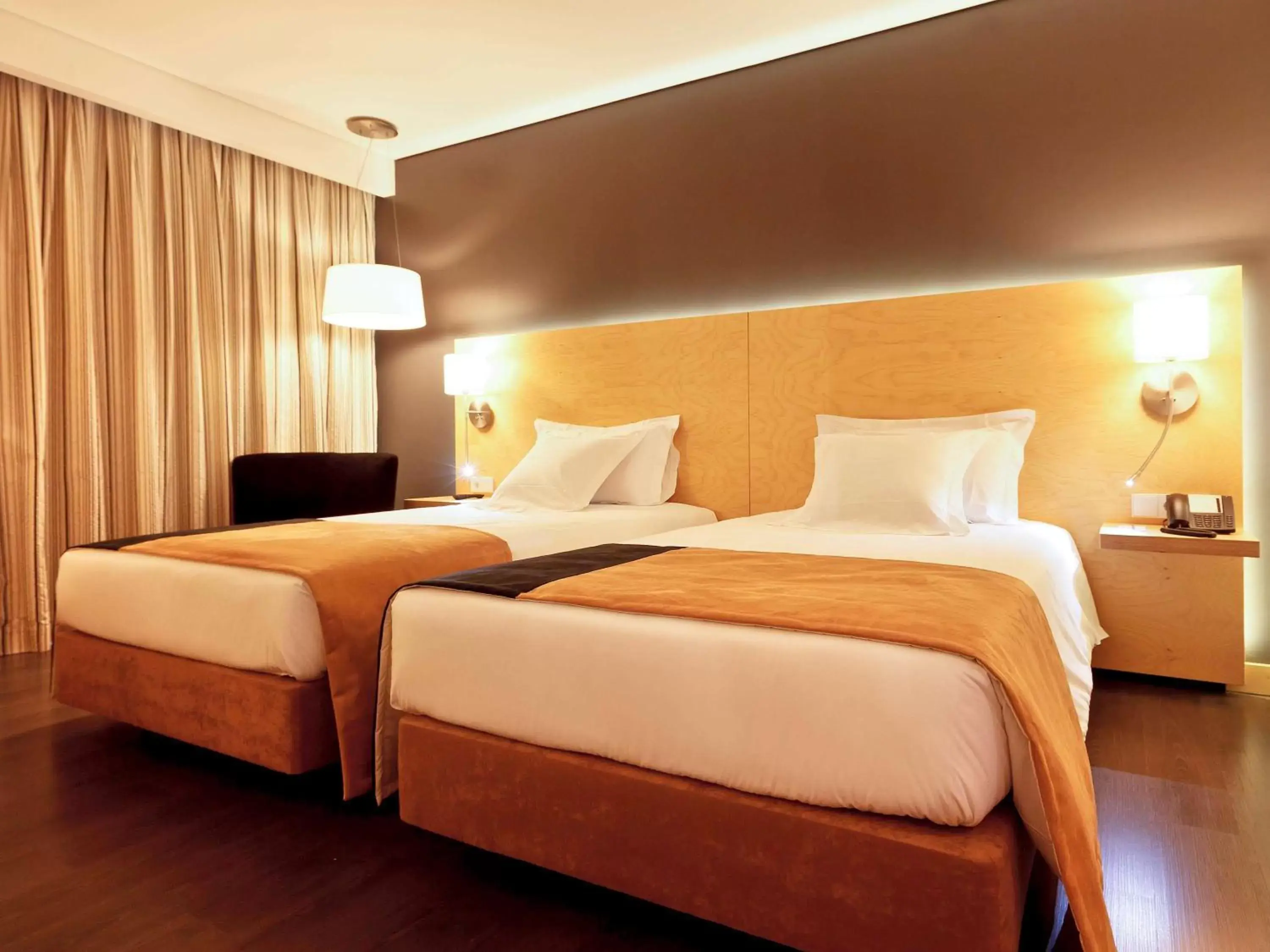 Photo of the whole room, Bed in Hotel Mercure Braga Centro