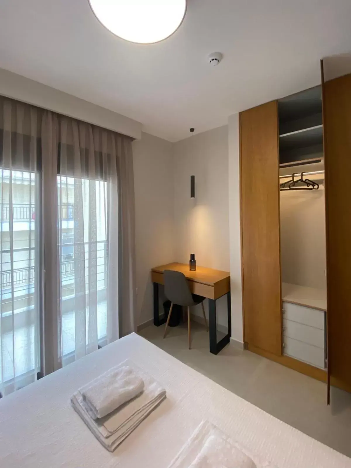 Bedroom, Bed in Toumba apartments