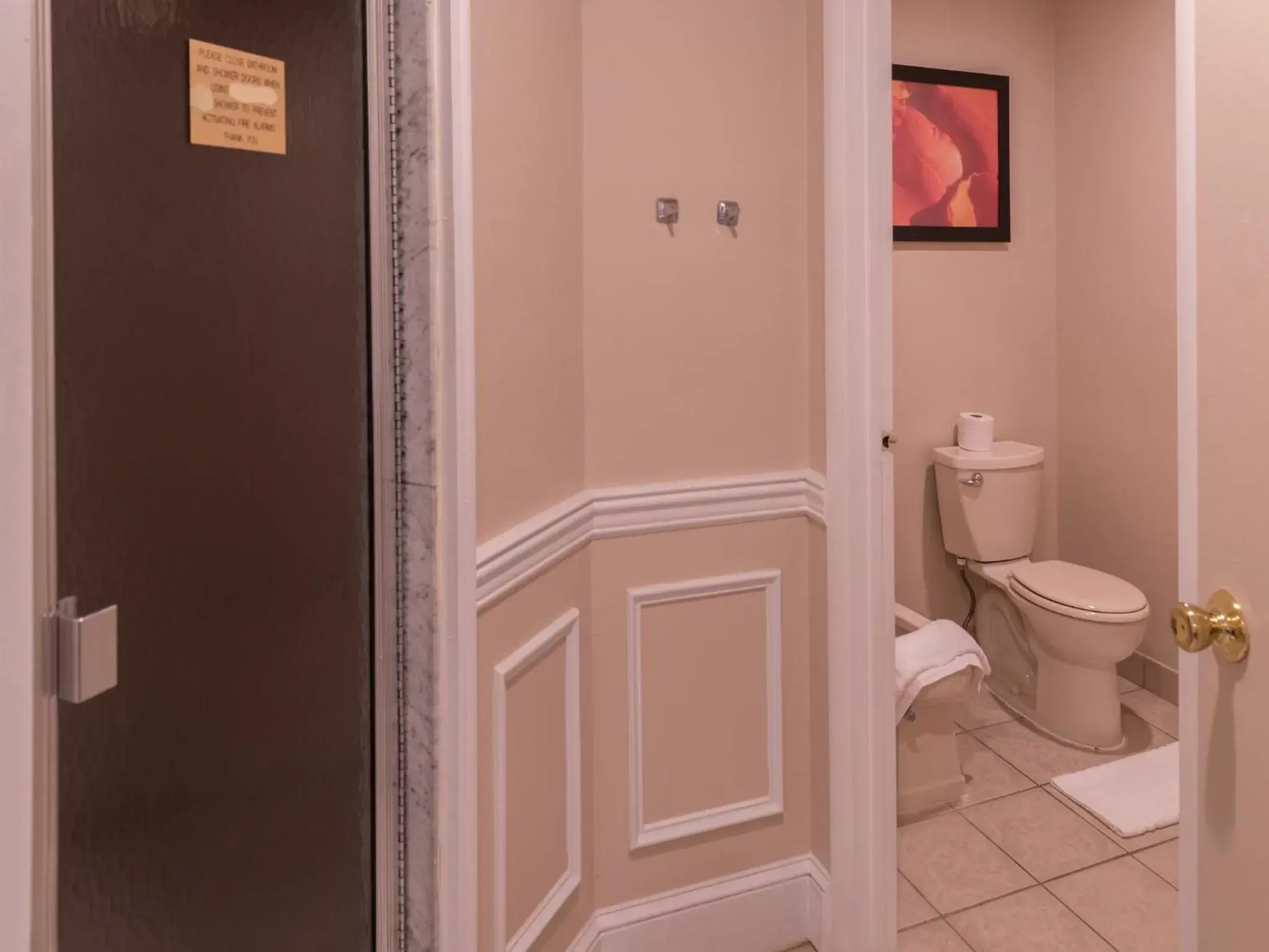 Toilet, Bathroom in Inn of The Dove Romantic Luxury & Business Suites