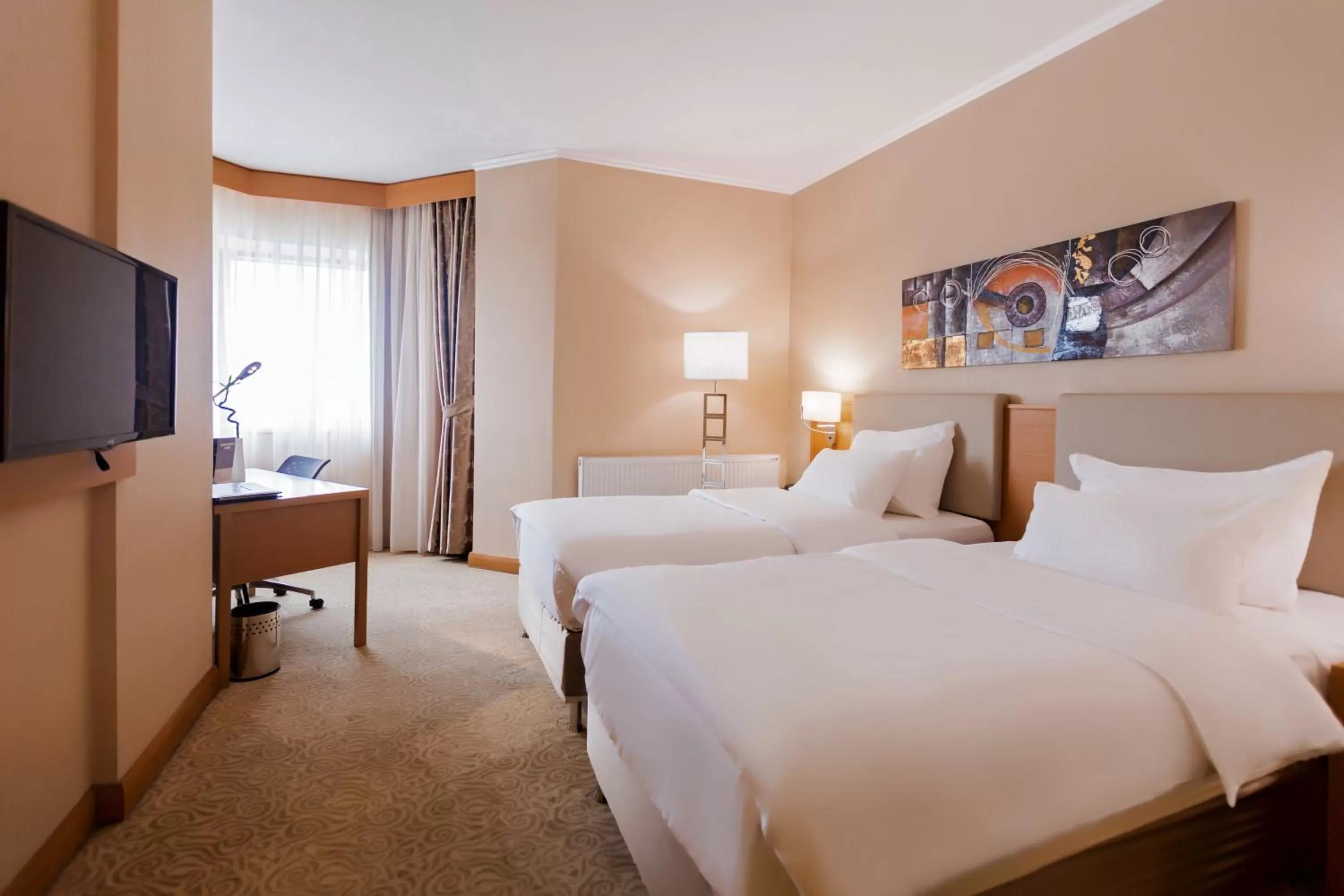 Bed in Dedeman Oskemen Hotel