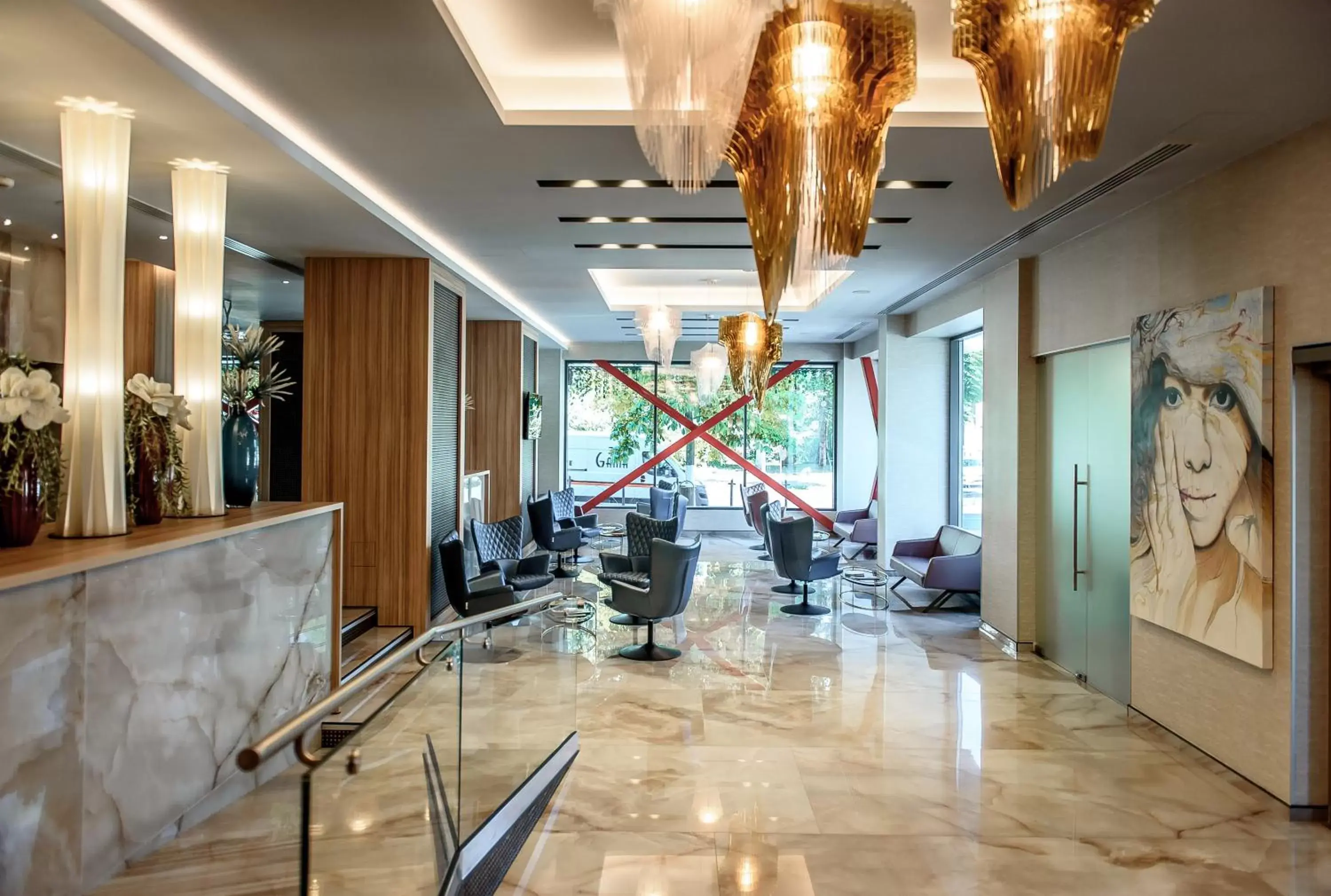 Lobby or reception in Ramada by Wyndham Ramnicu Valcea Lobby or reception in Ramada by Wyndham Ramnicu Valcea