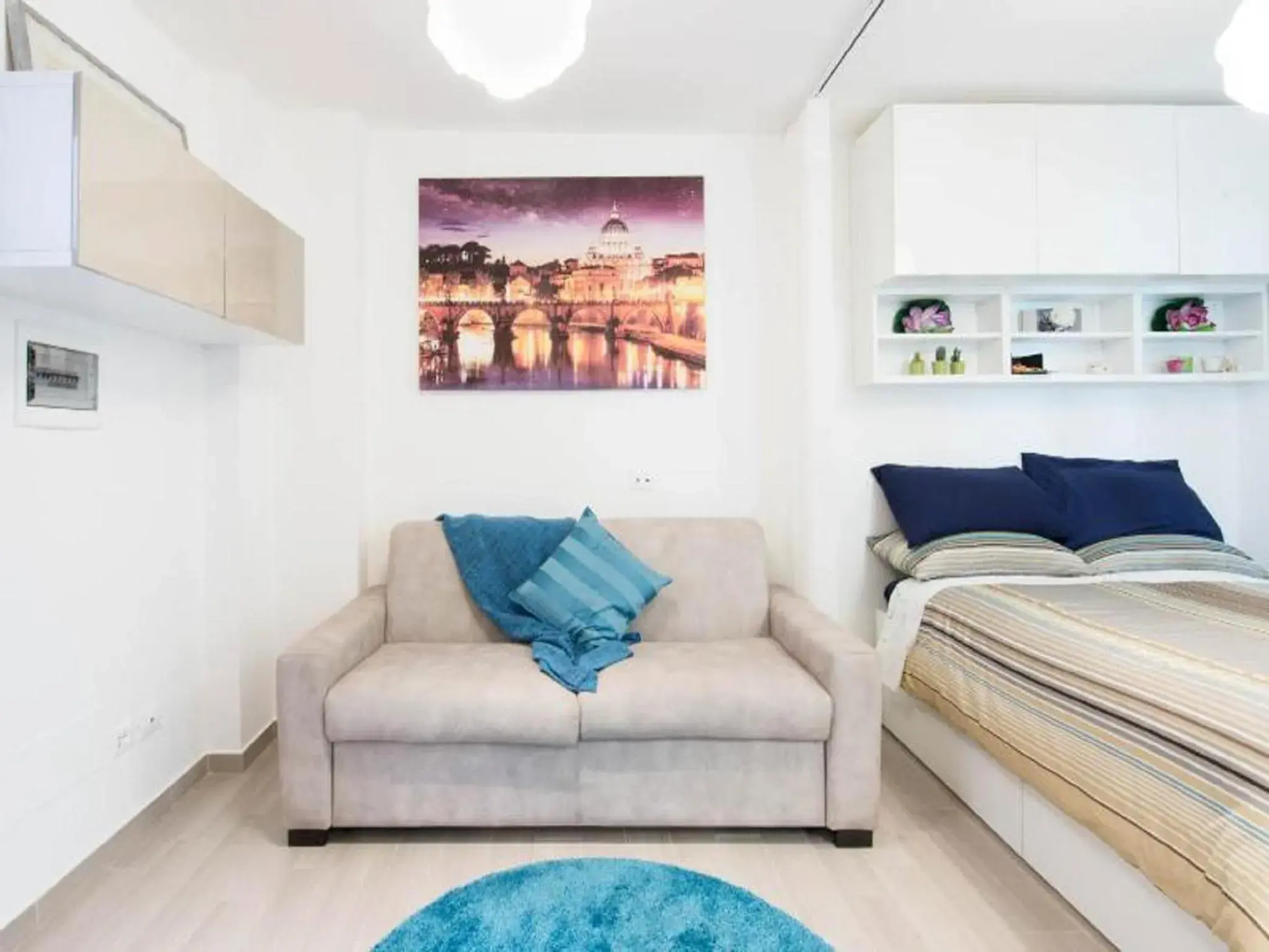 Bed, Seating Area in Condotti Apartment