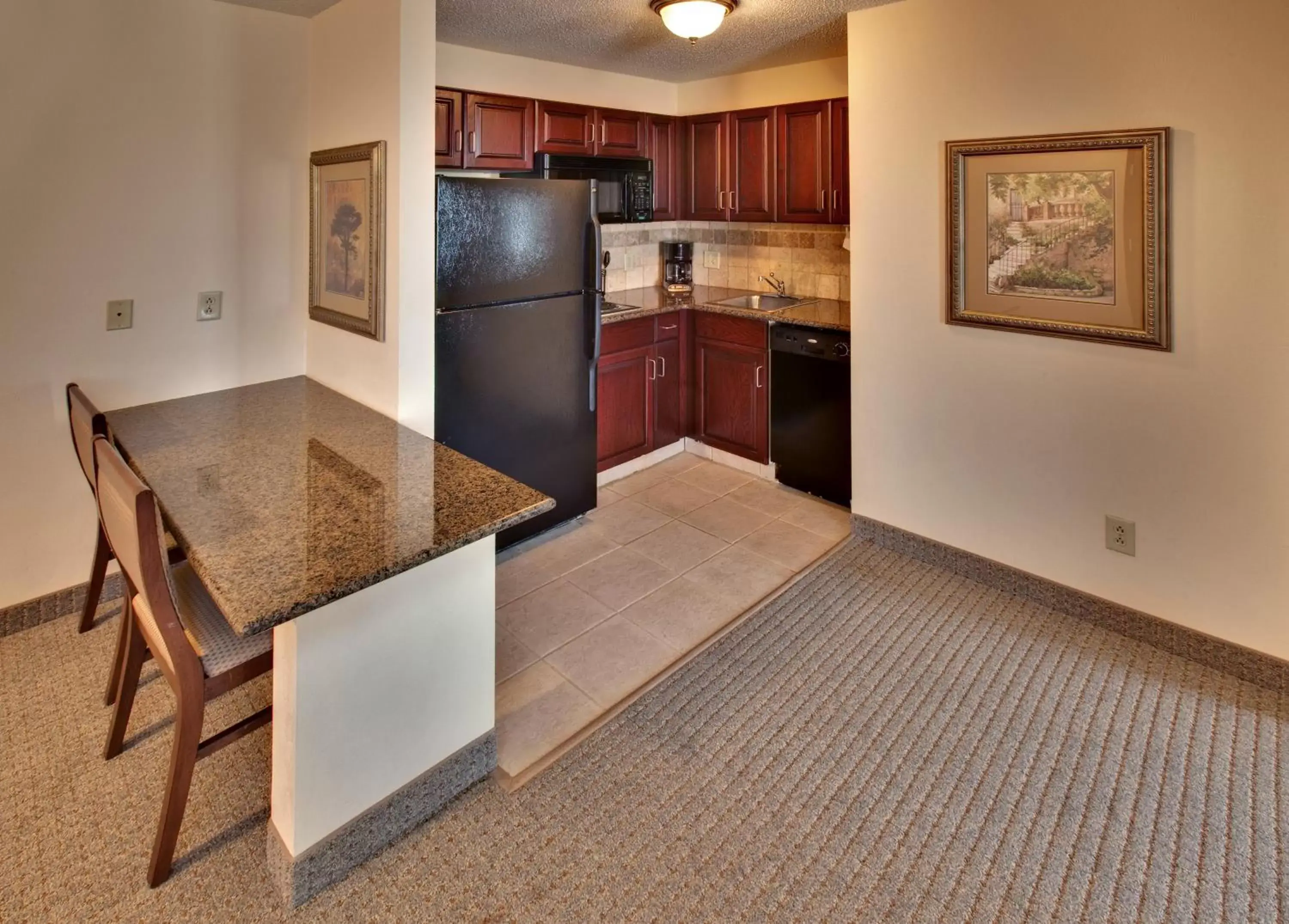 Photo of the whole room, Kitchen/Kitchenette in Staybridge Suites West Des Moines, an IHG Hotel