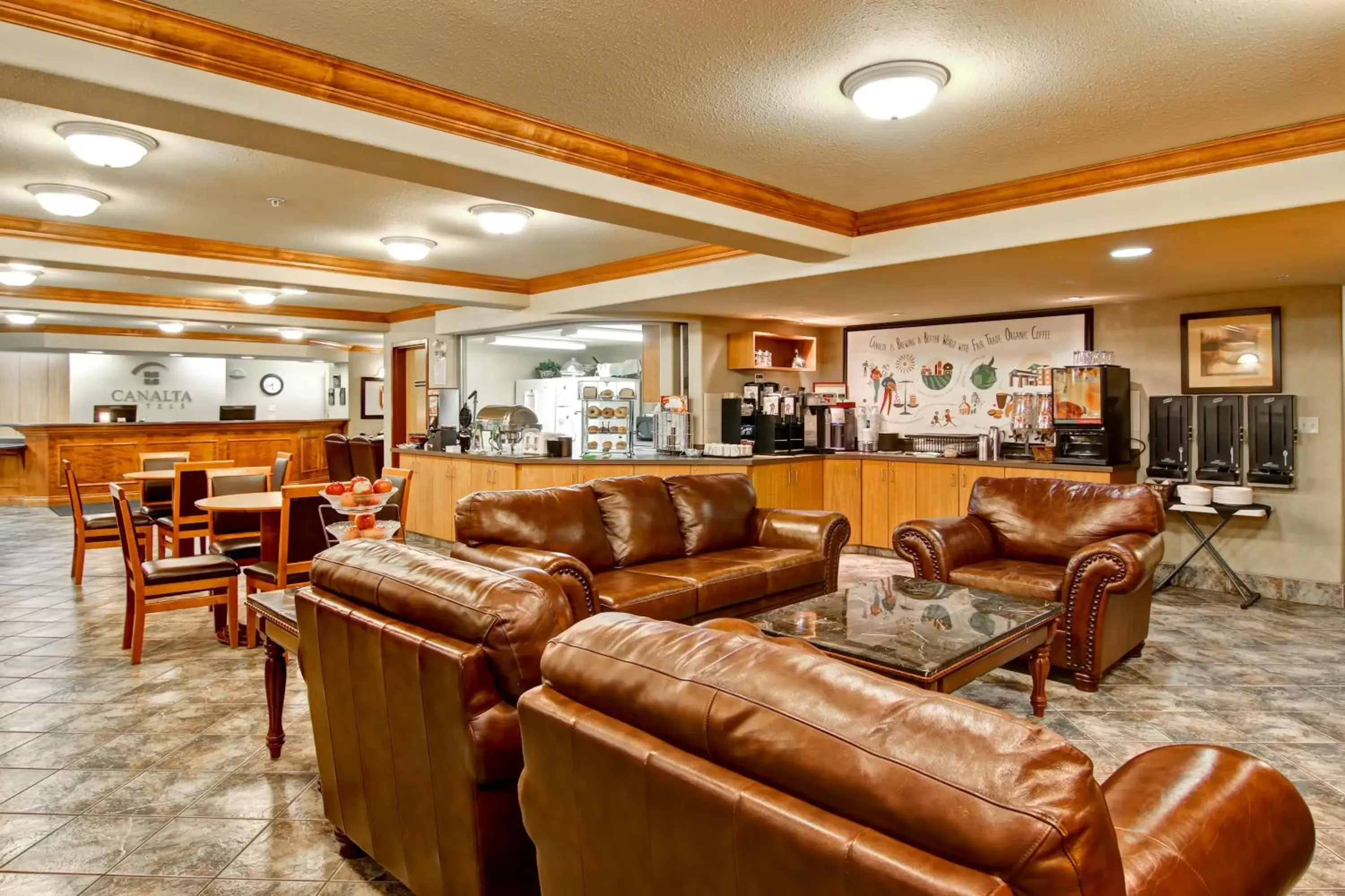 Seating area, Lobby/Reception in Ramada by Wyndham Ponoka