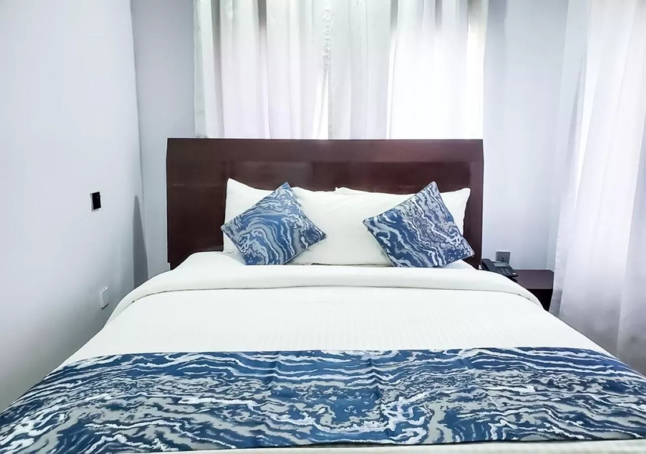 Bed in Medallion Hotels