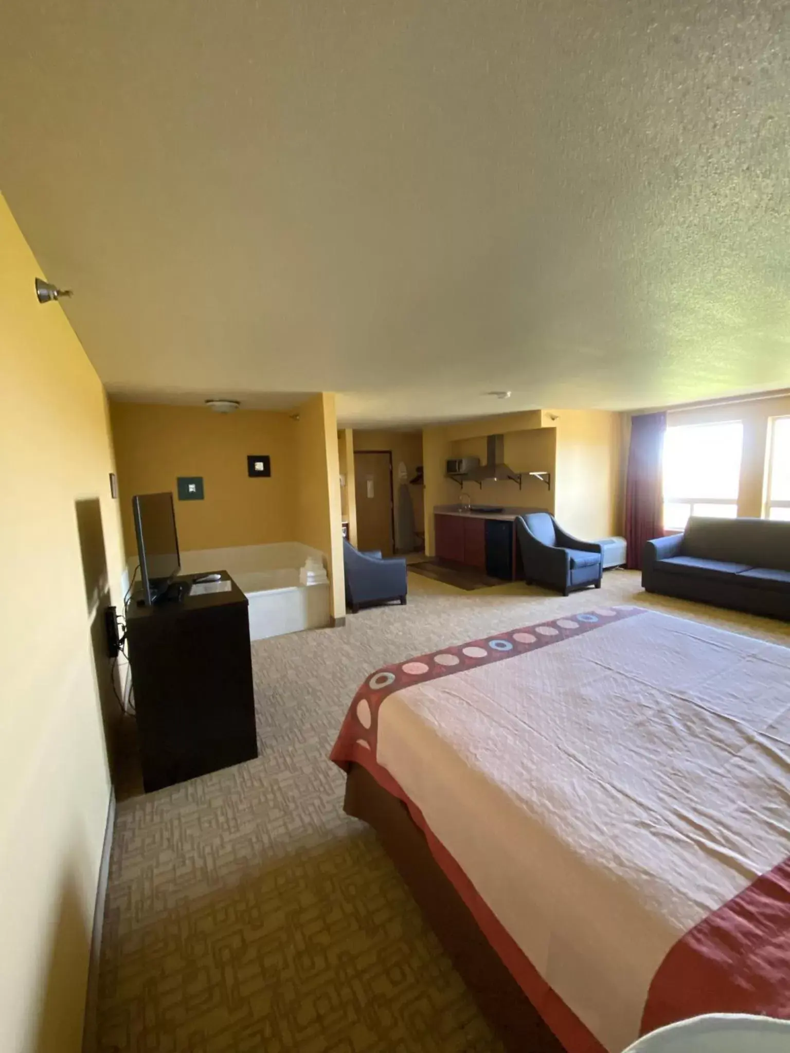 Bed in Super 8 by Wyndham Jackson MN