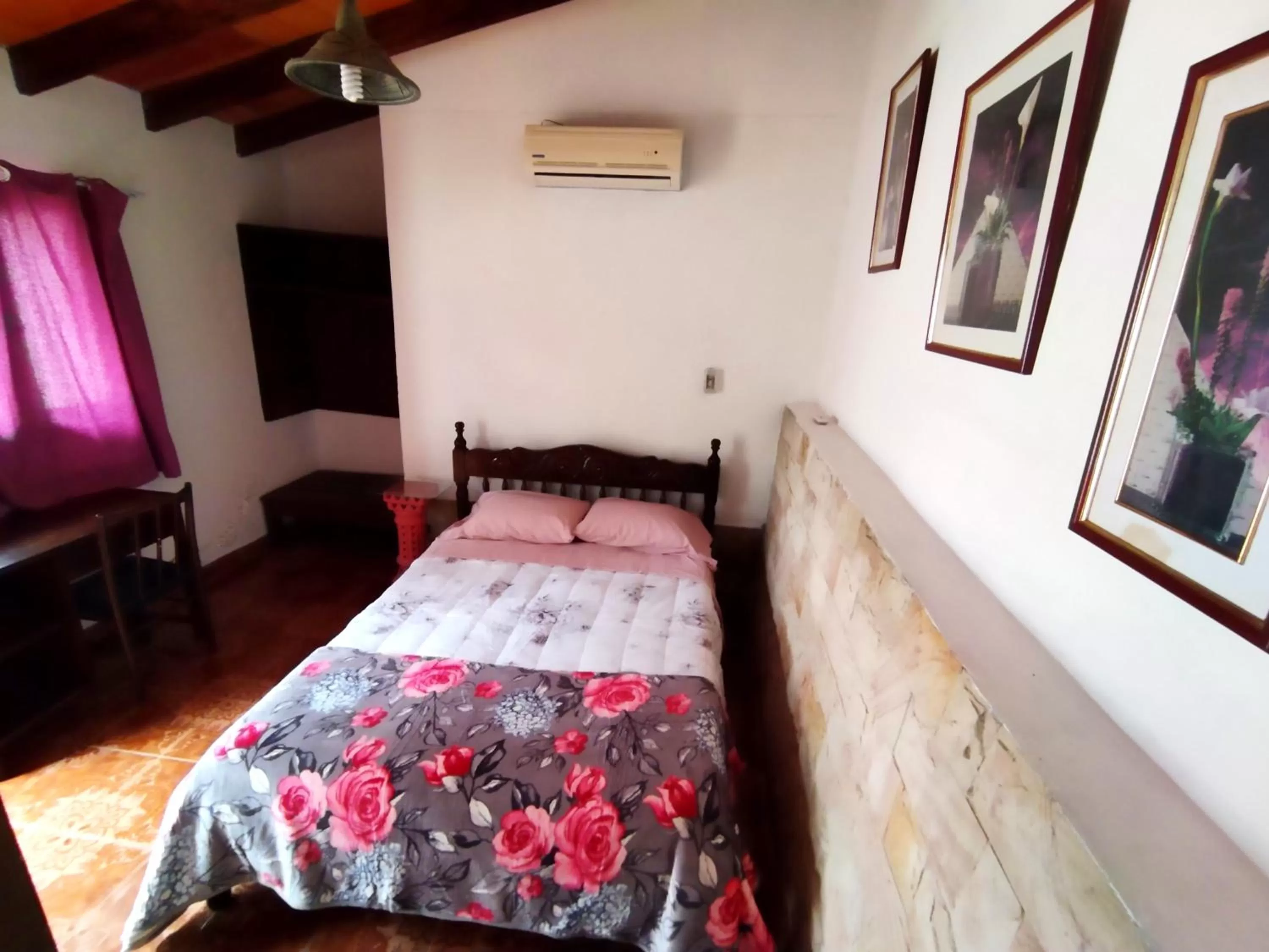 Bed in Hotel La Aparesida