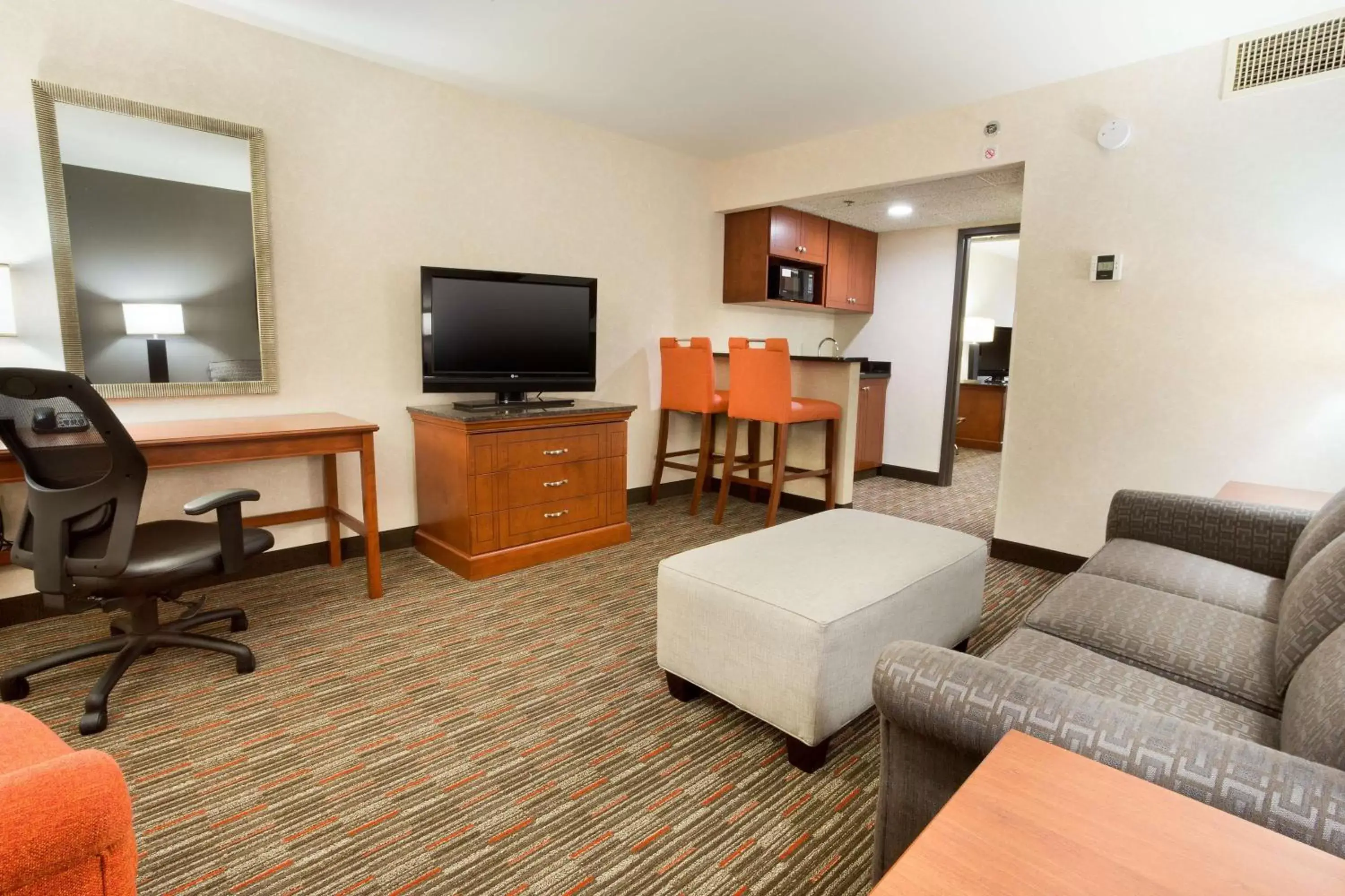 Photo of the whole room, TV/Entertainment Center in Drury Inn & Suites St. Louis Creve Coeur