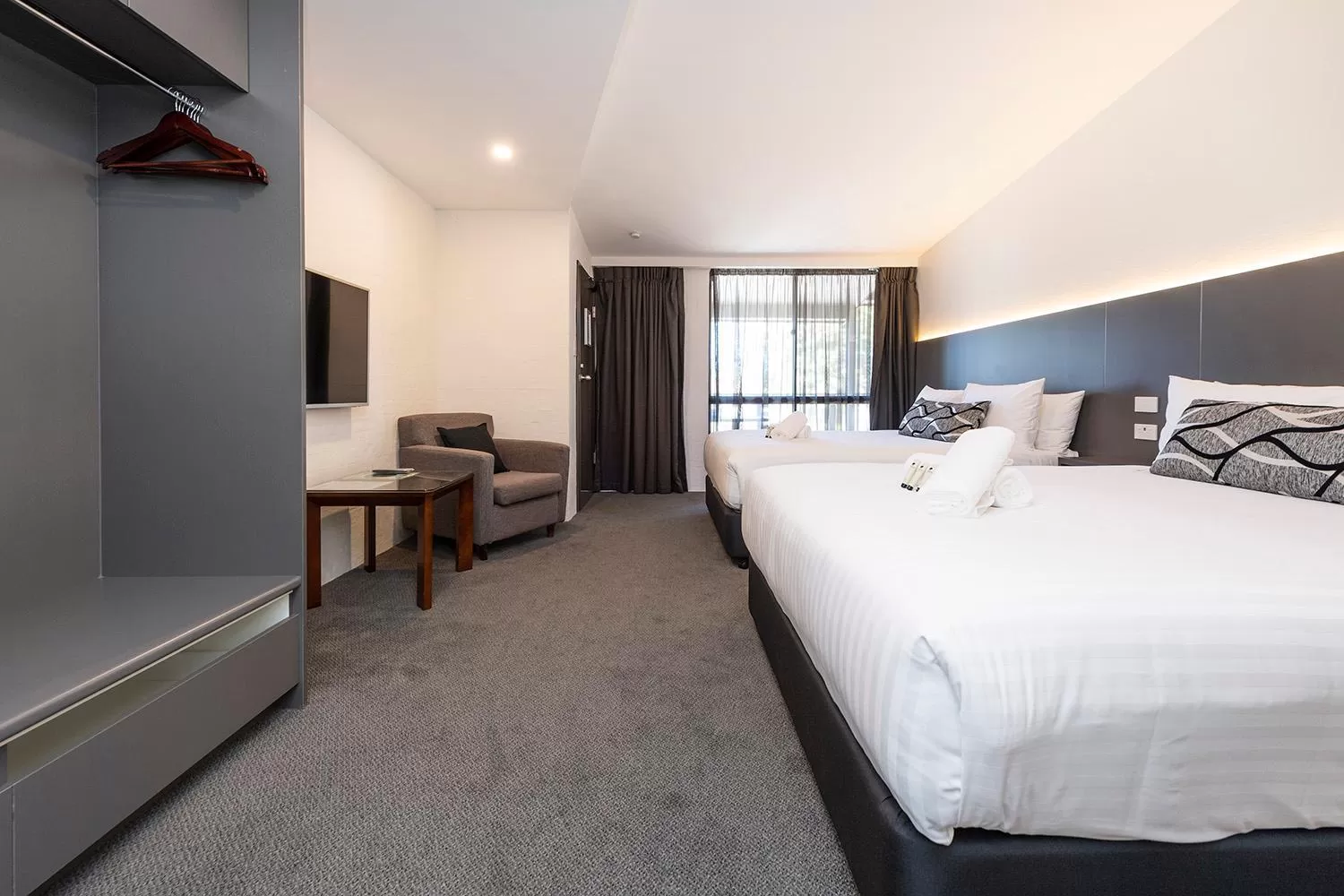 Bed in Fern Bay Motel