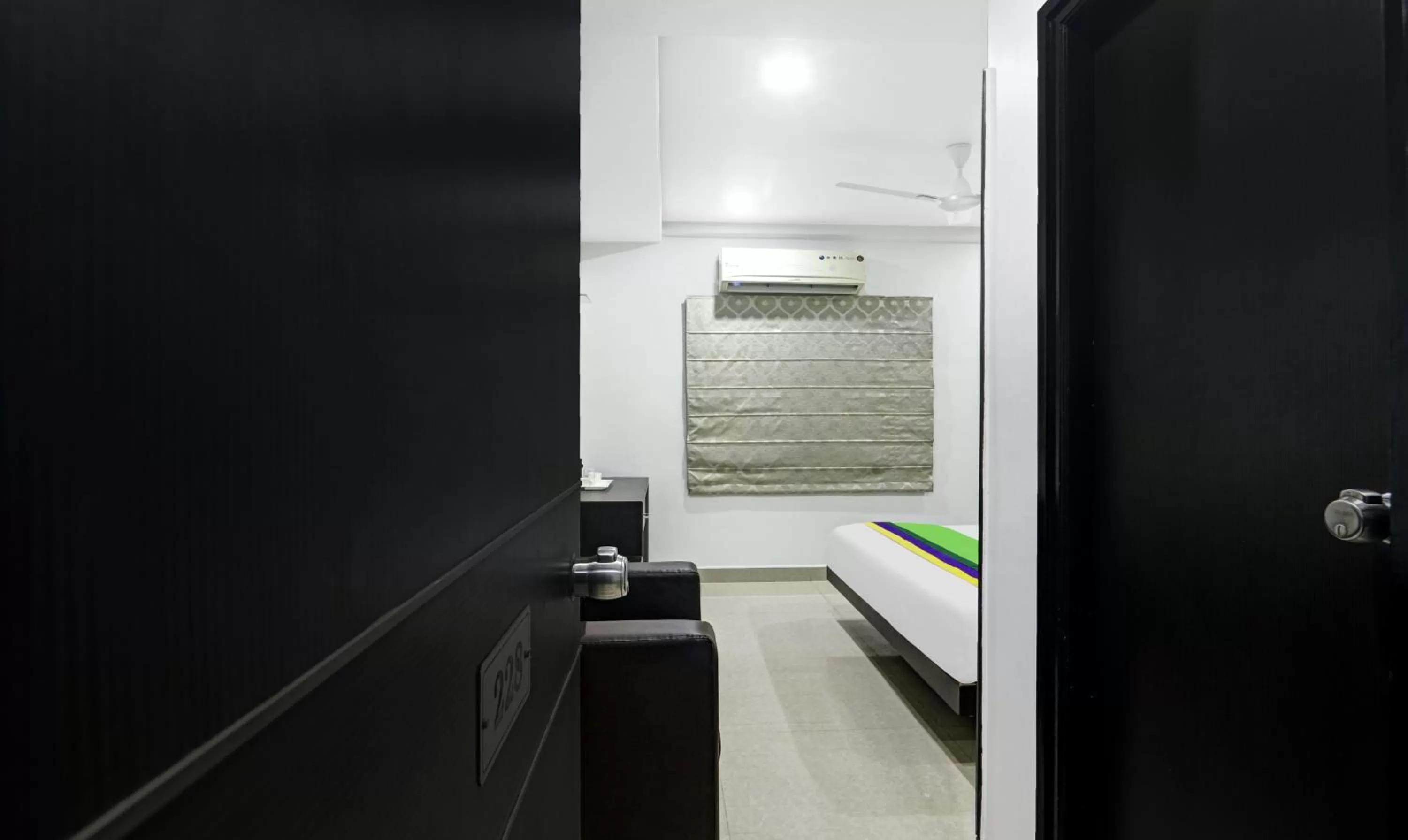 Bedroom in Treebo Kruthika Residency